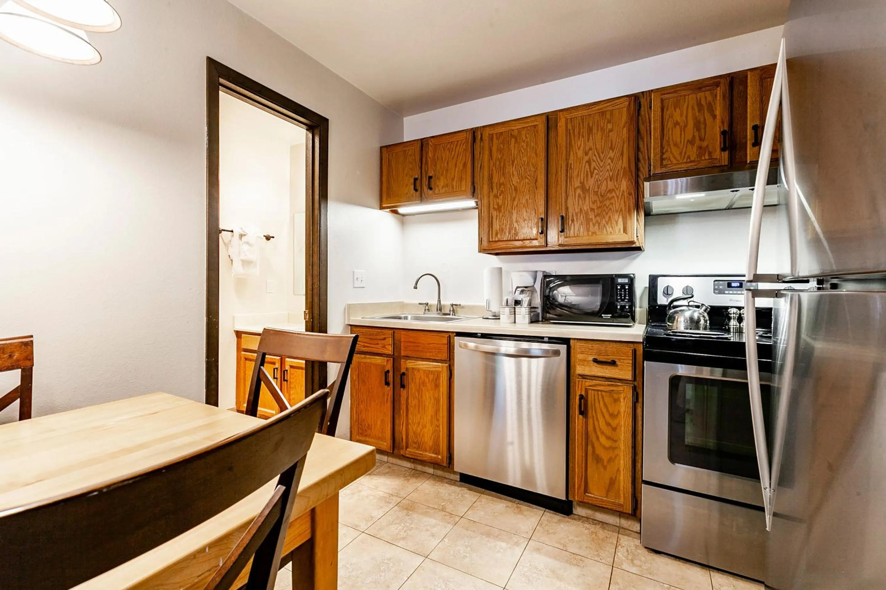 Kitchen or kitchenette in Red Pine Condominiums by All Seasons Resort Lodging