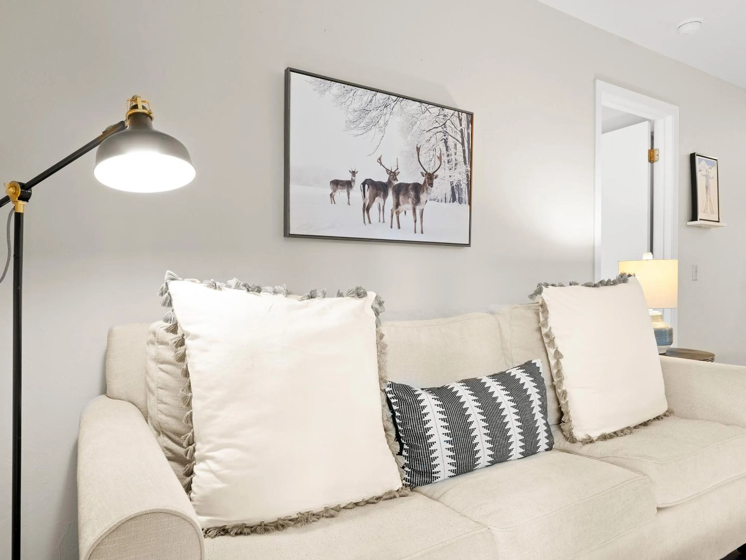 Living room in Red Pine Condominiums by All Seasons Resort Lodging