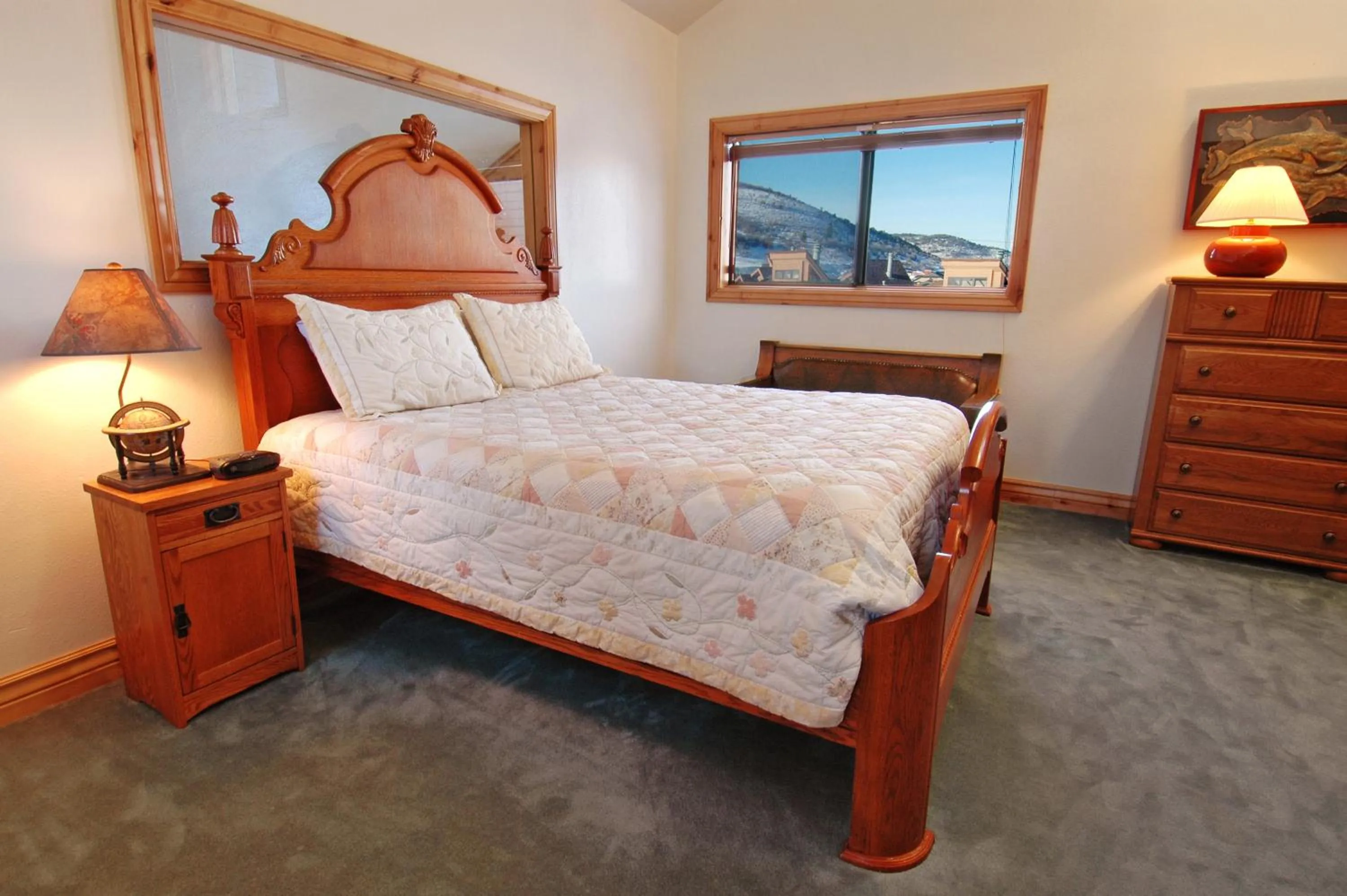 Bed in Red Pine Condominiums by All Seasons Resort Lodging