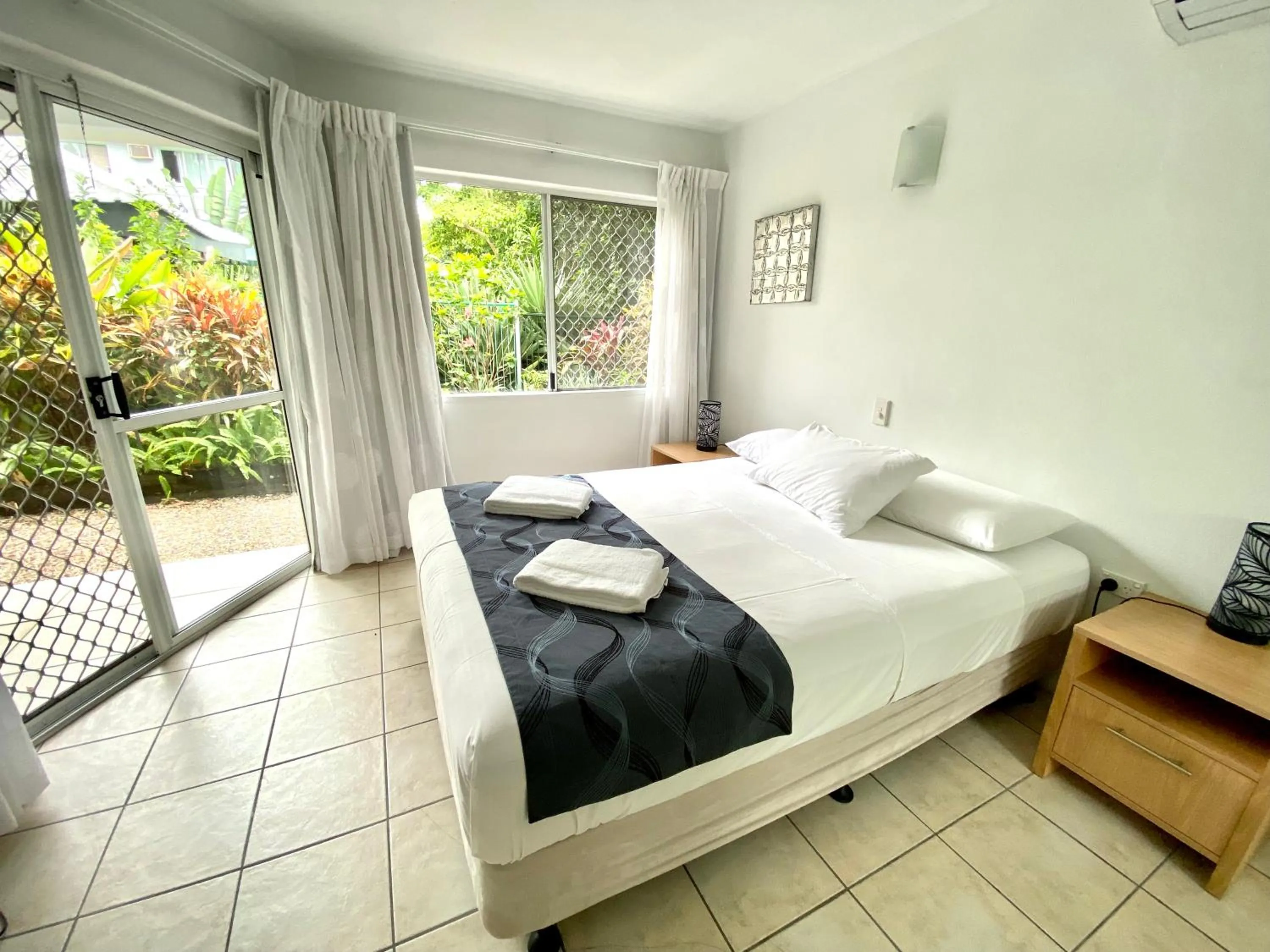 Bed in Reef Gateway Apartments