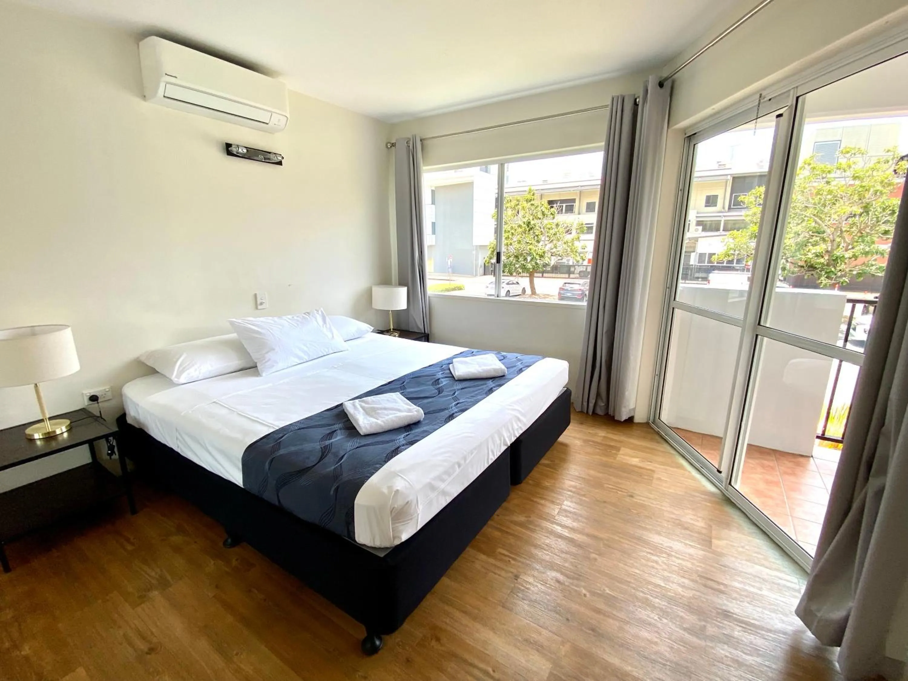 Bed in Reef Gateway Apartments