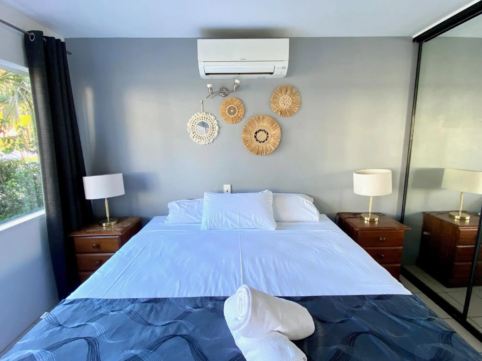 Bed in Reef Gateway Apartments