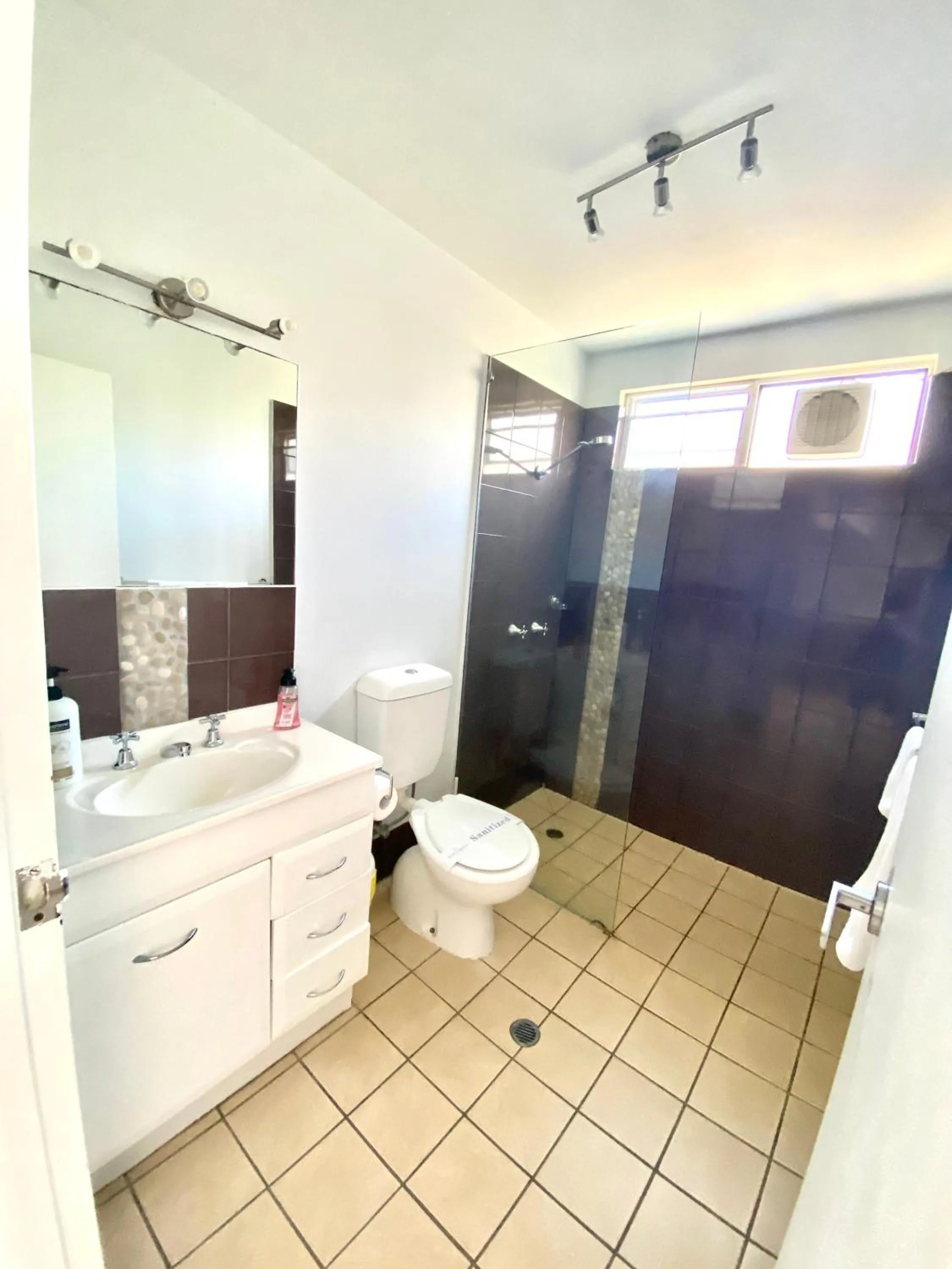 Shower in Reef Gateway Apartments