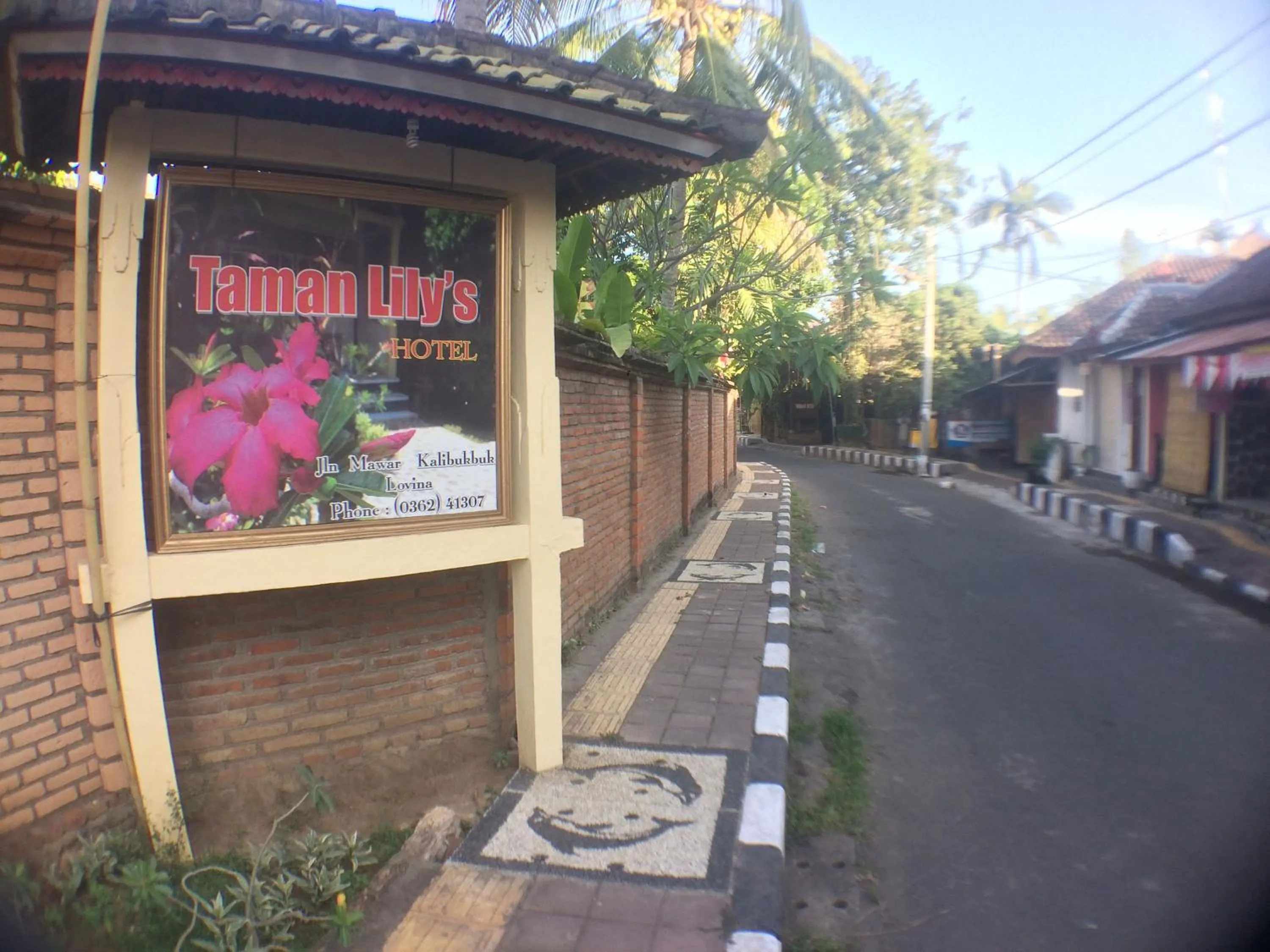 Property logo or sign in Taman Lily's Hotel