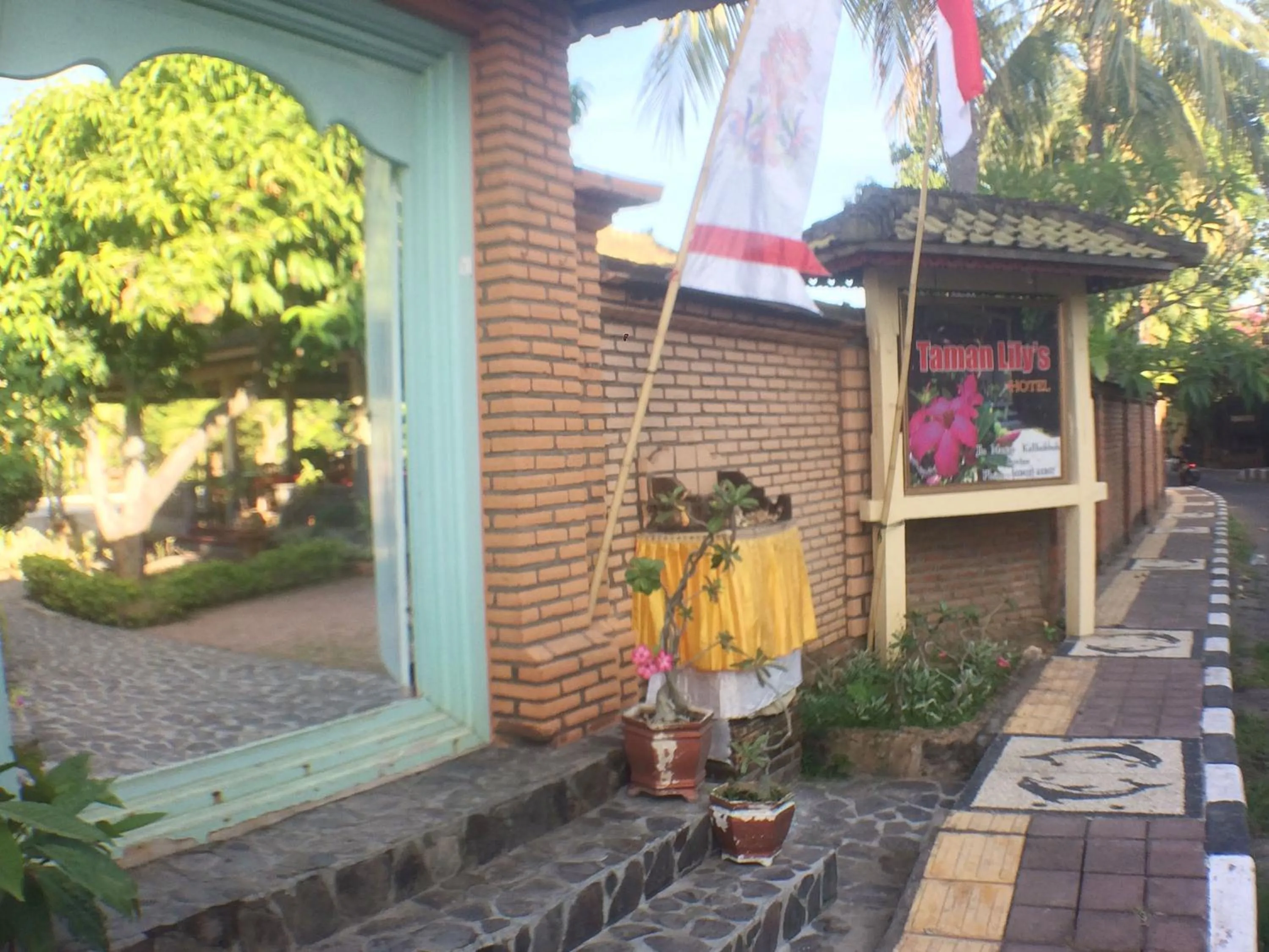 Property logo or sign in Taman Lily's Hotel