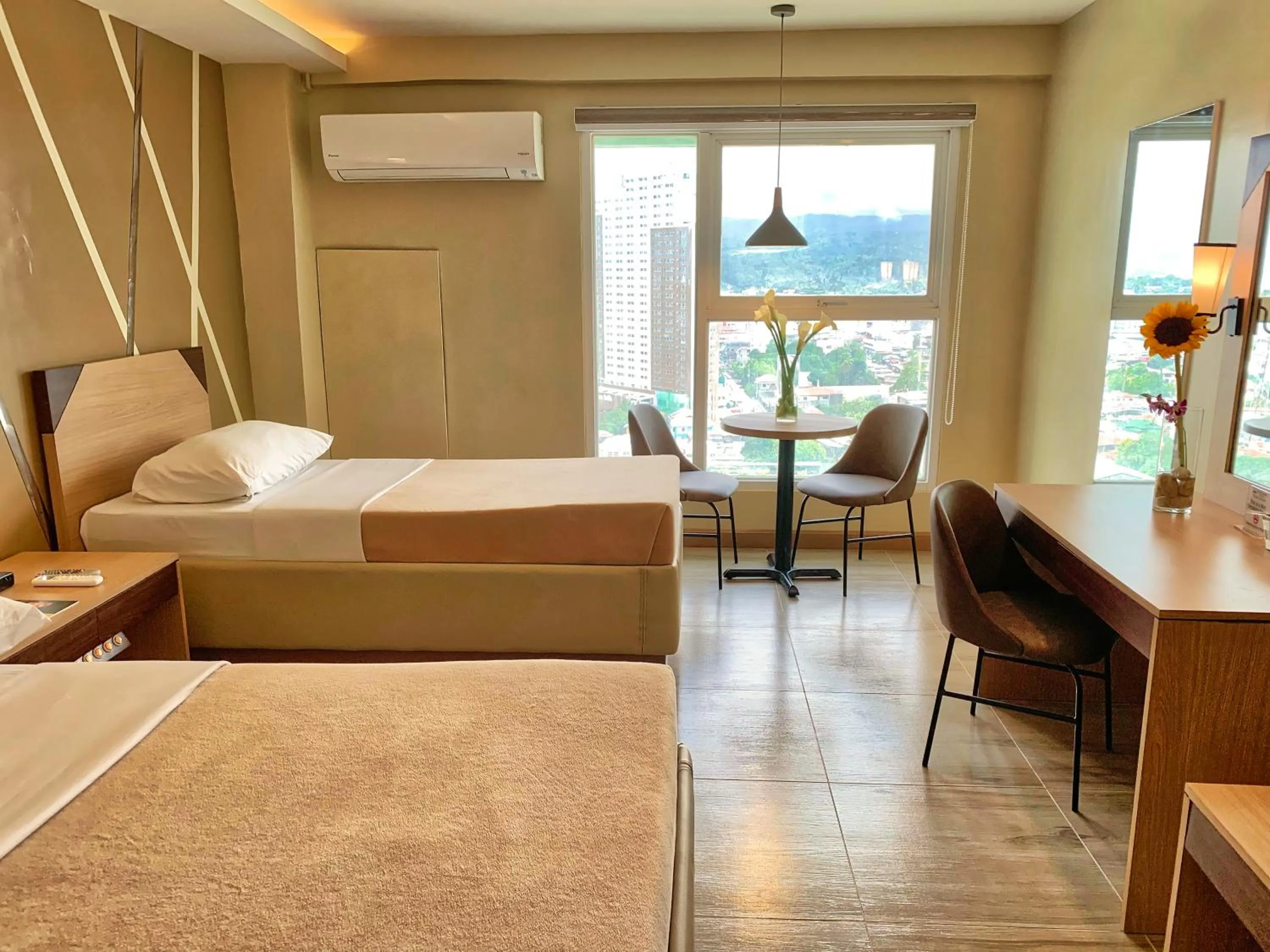 Photo of the whole room in New Dawn Hotel Plus