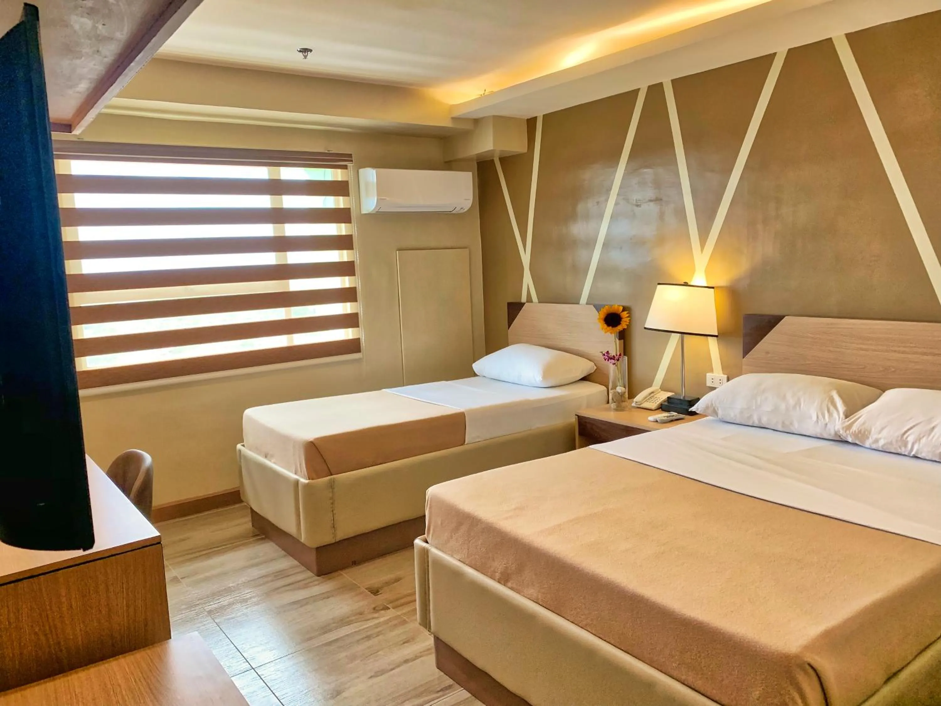 Photo of the whole room in New Dawn Hotel Plus