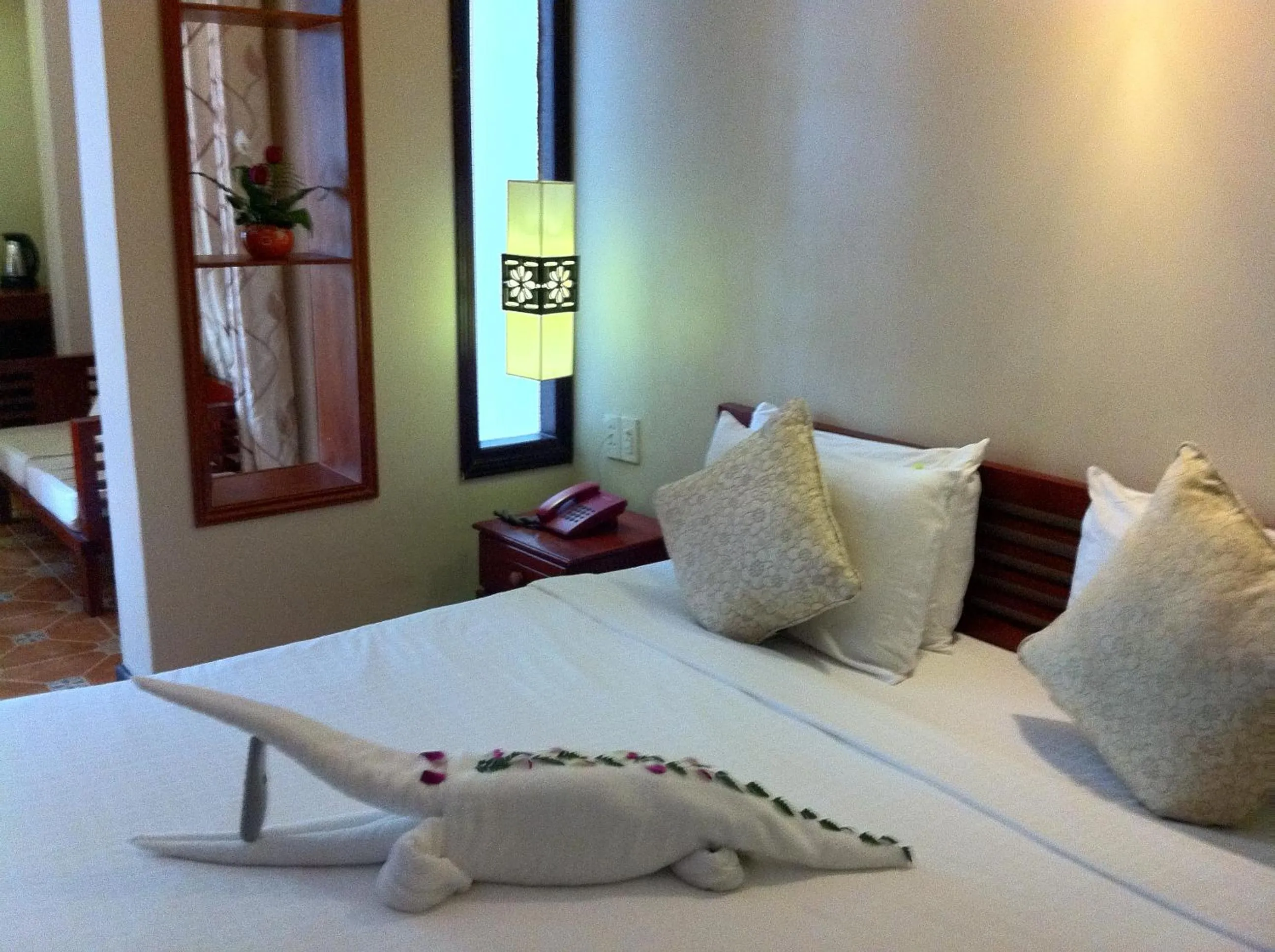 Bed in Long Life Riverside Hotel