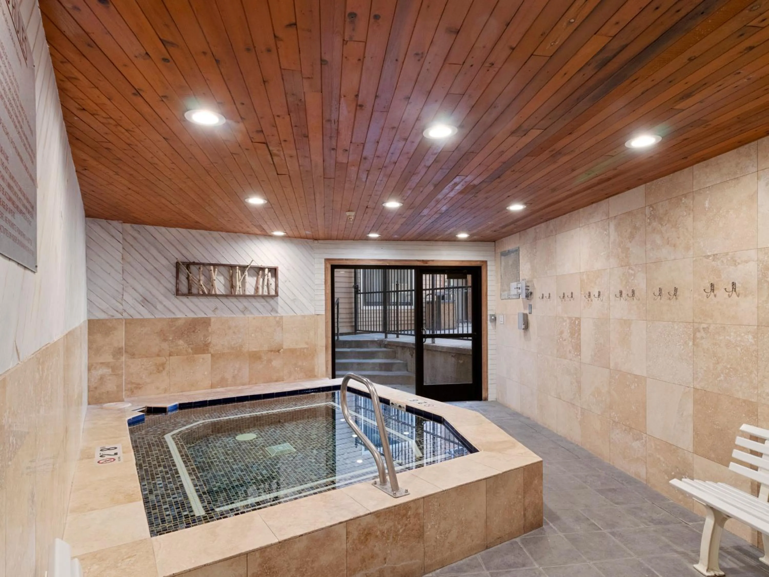 Hot Tub in Carriage House Condominiums by All Seasons Resort Lodging