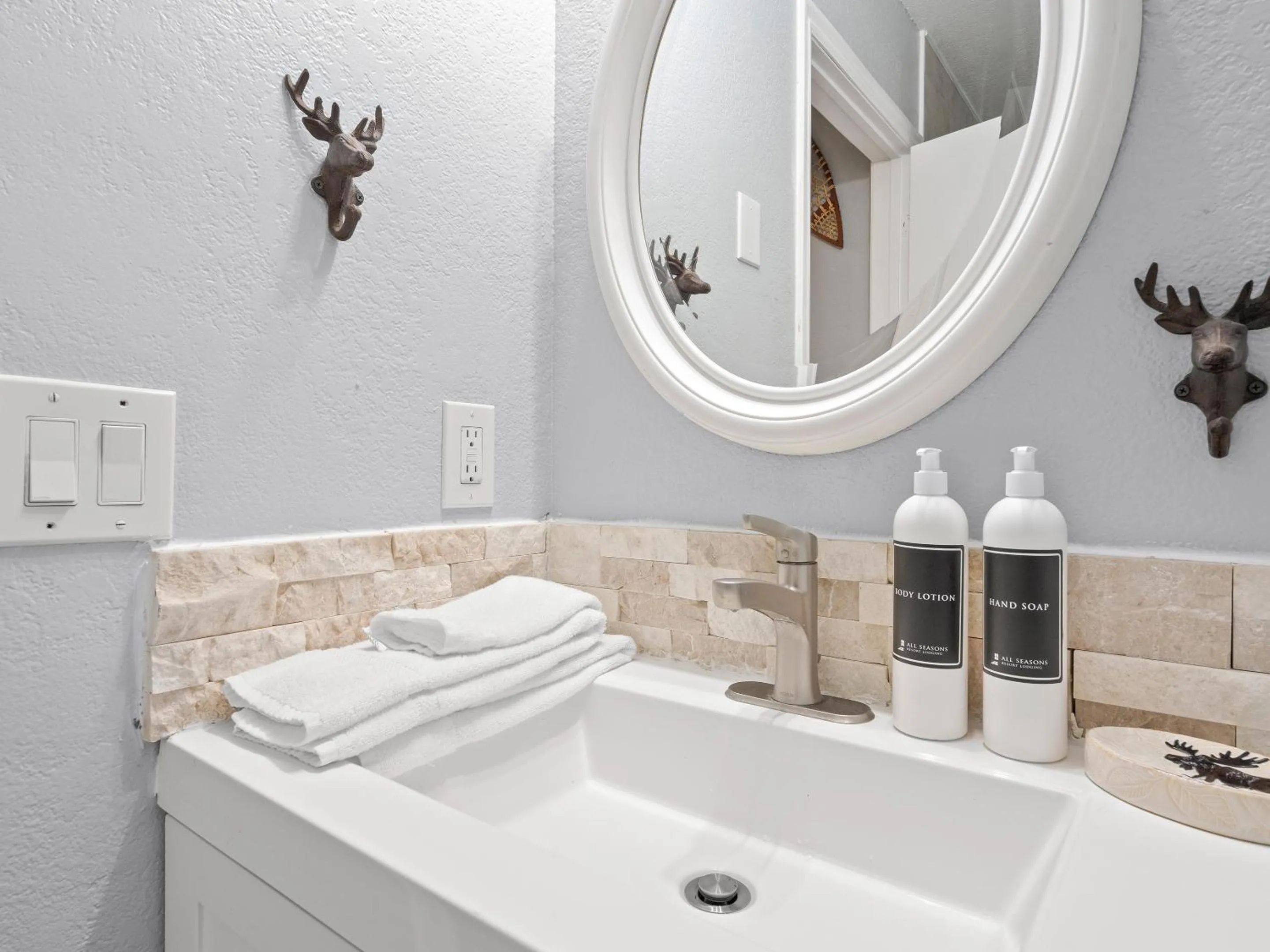 Bathroom in Carriage House Condominiums by All Seasons Resort Lodging