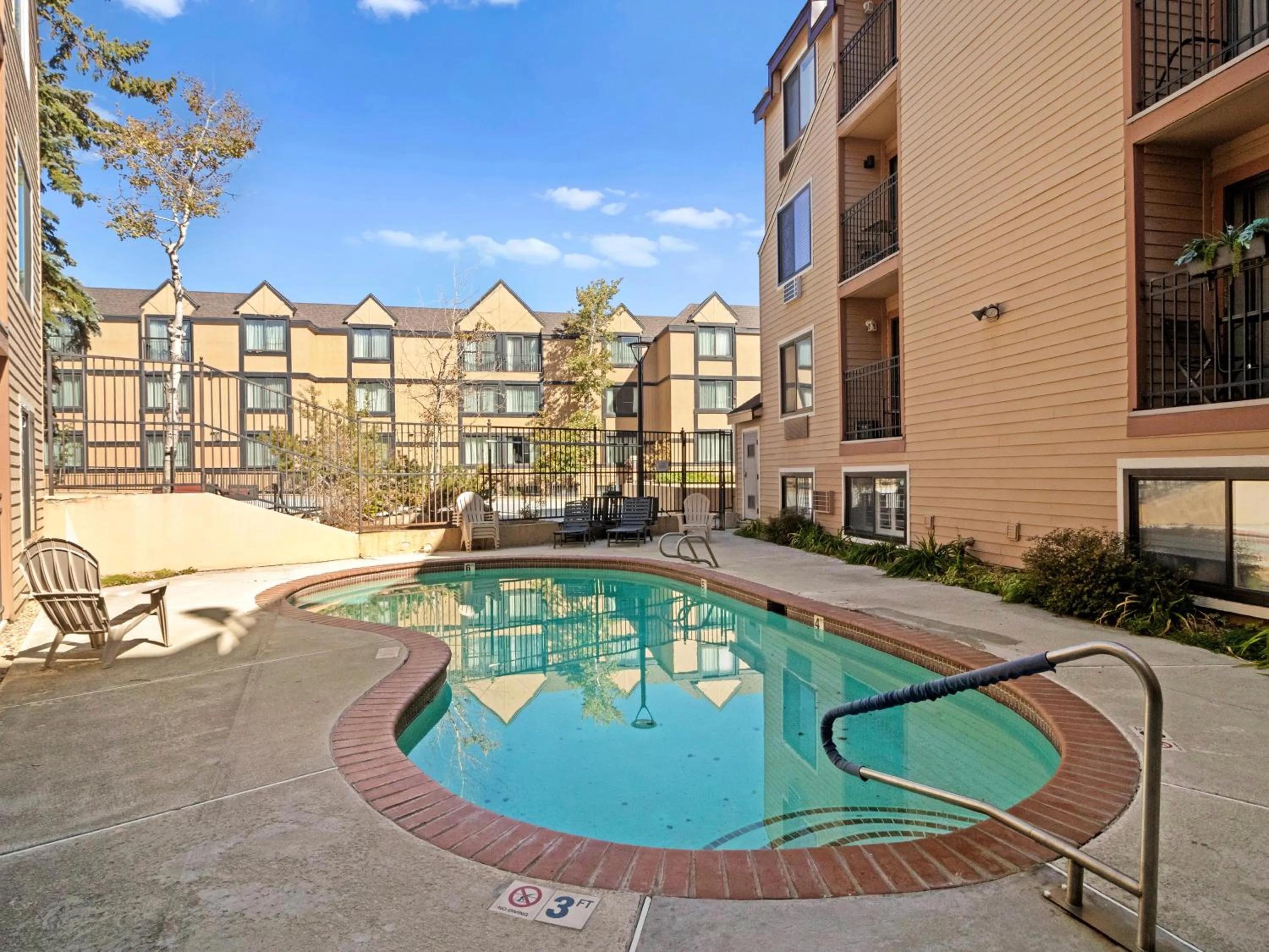 Swimming pool in Carriage House Condominiums by All Seasons Resort Lodging
