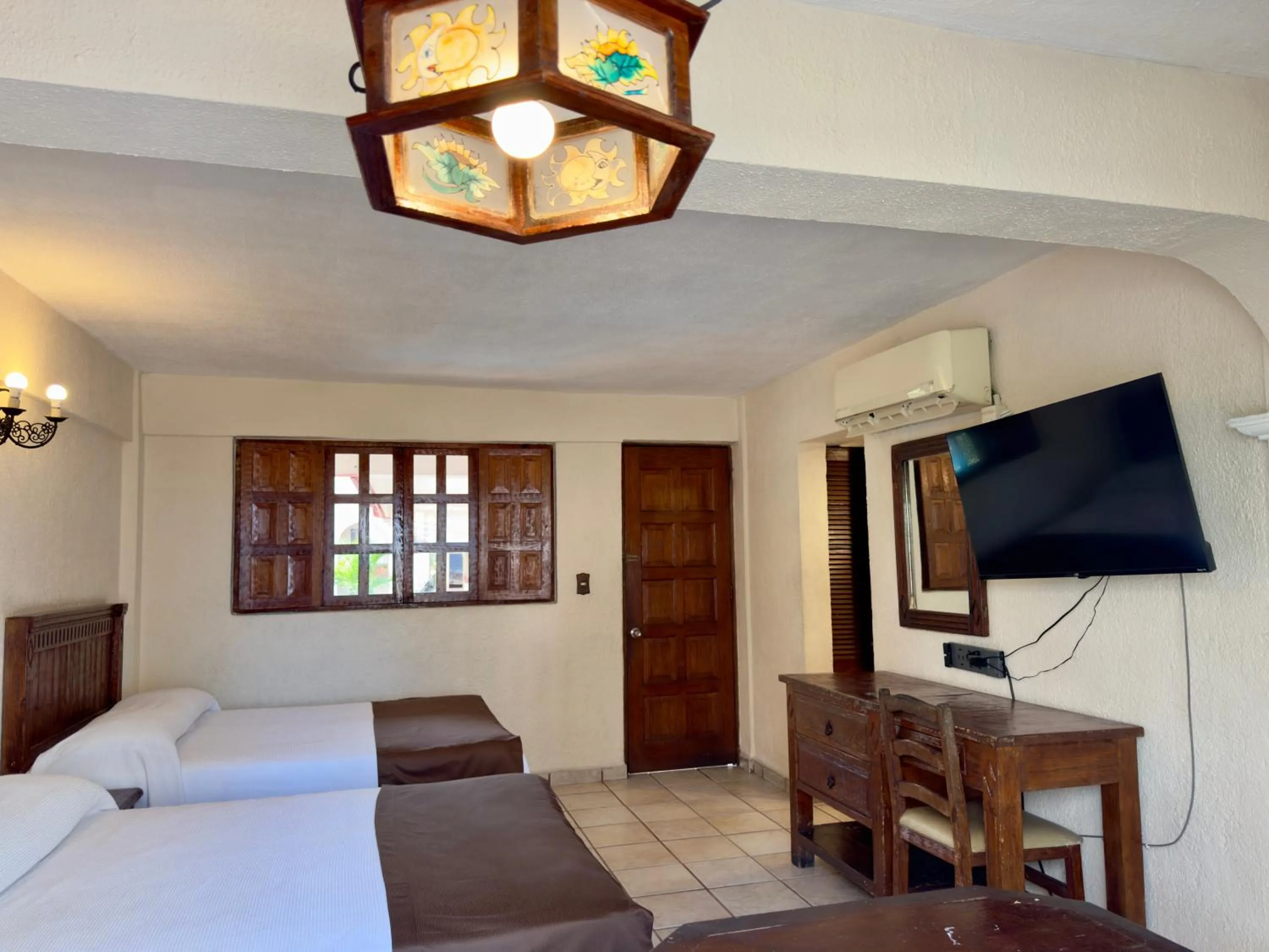 Bed in Hotel Hacienda María Eugenia Acapulco