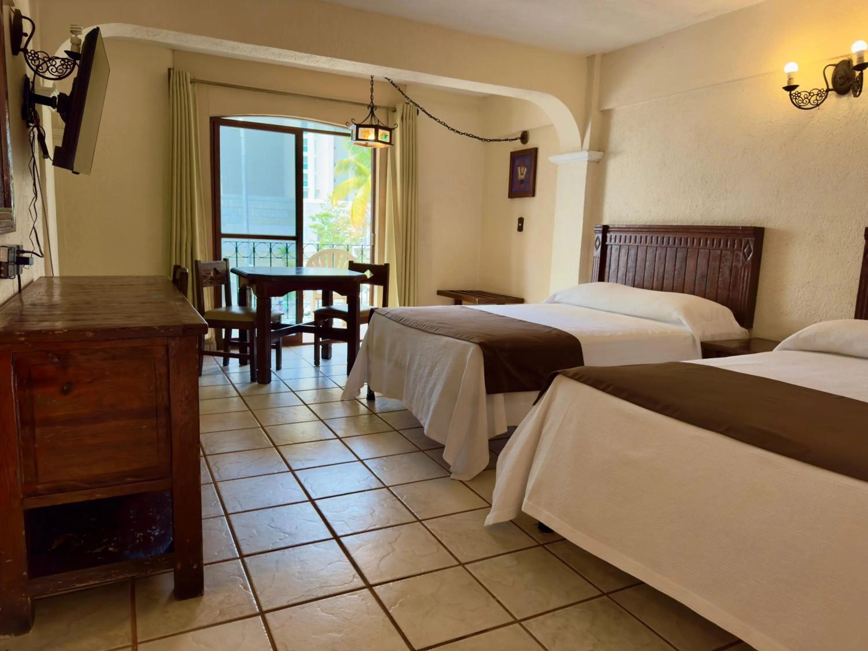 Bed in Hotel Hacienda María Eugenia Acapulco