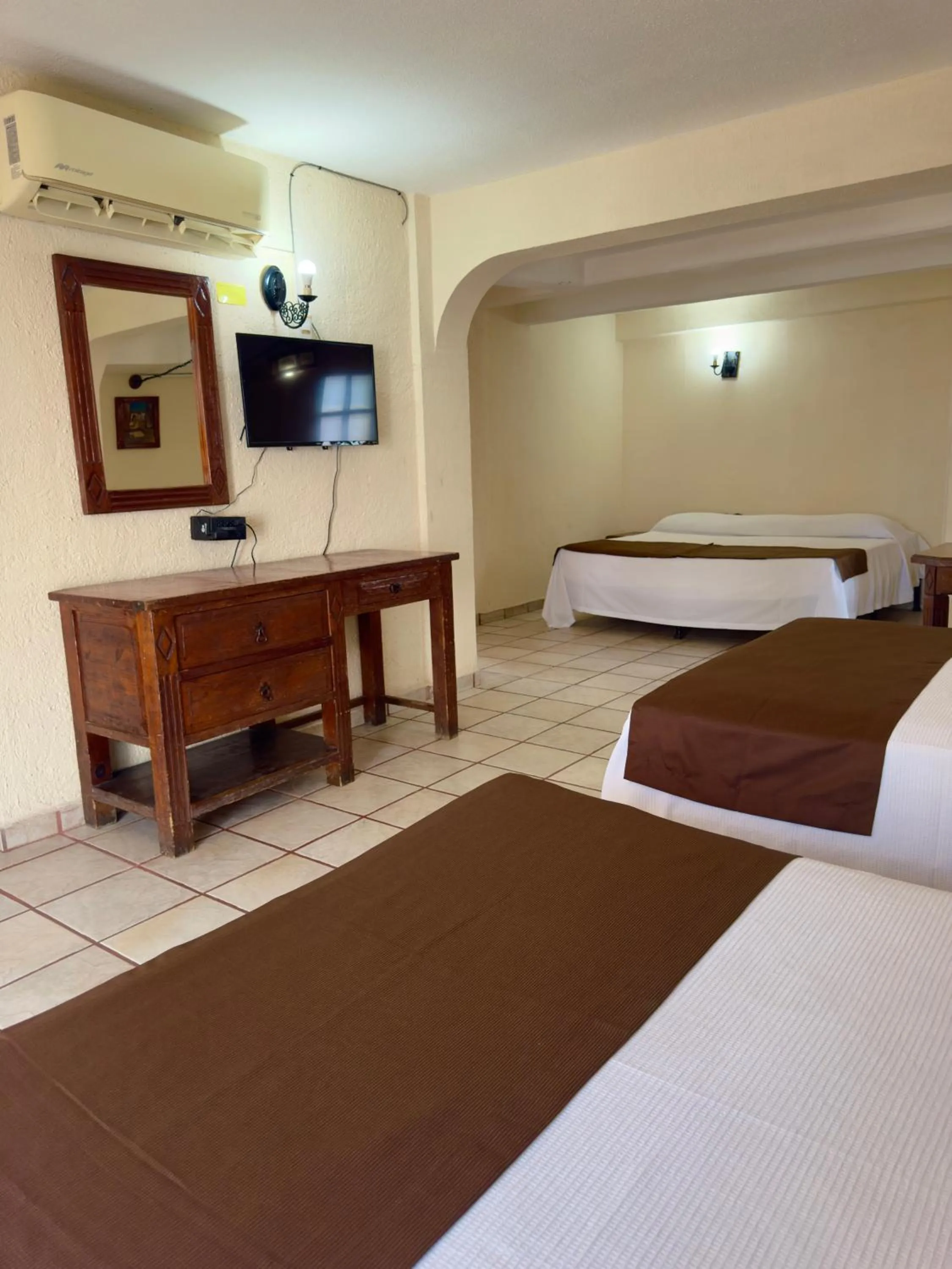 Bed in Hotel Hacienda María Eugenia Acapulco