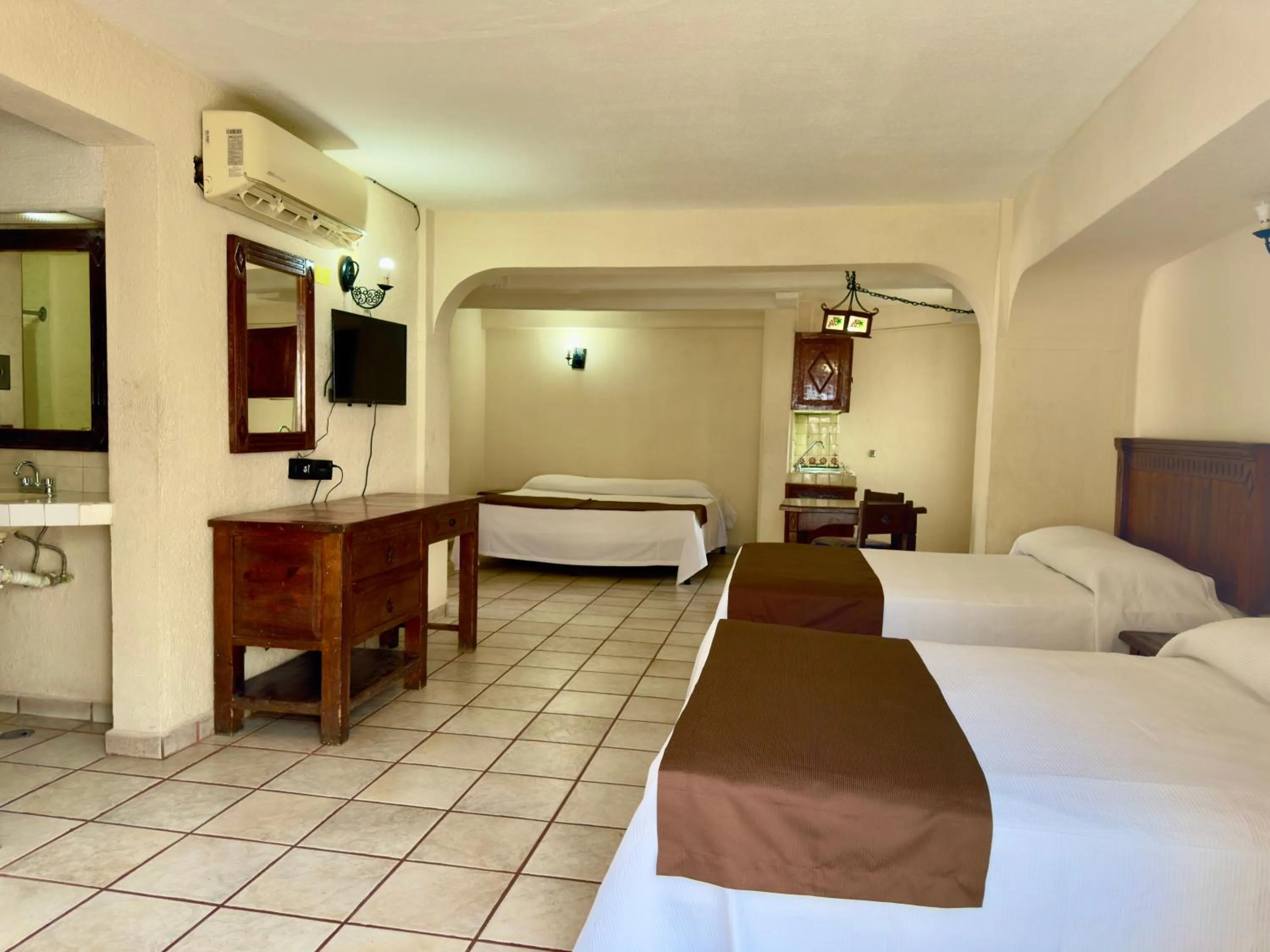 Bed in Hotel Hacienda María Eugenia Acapulco