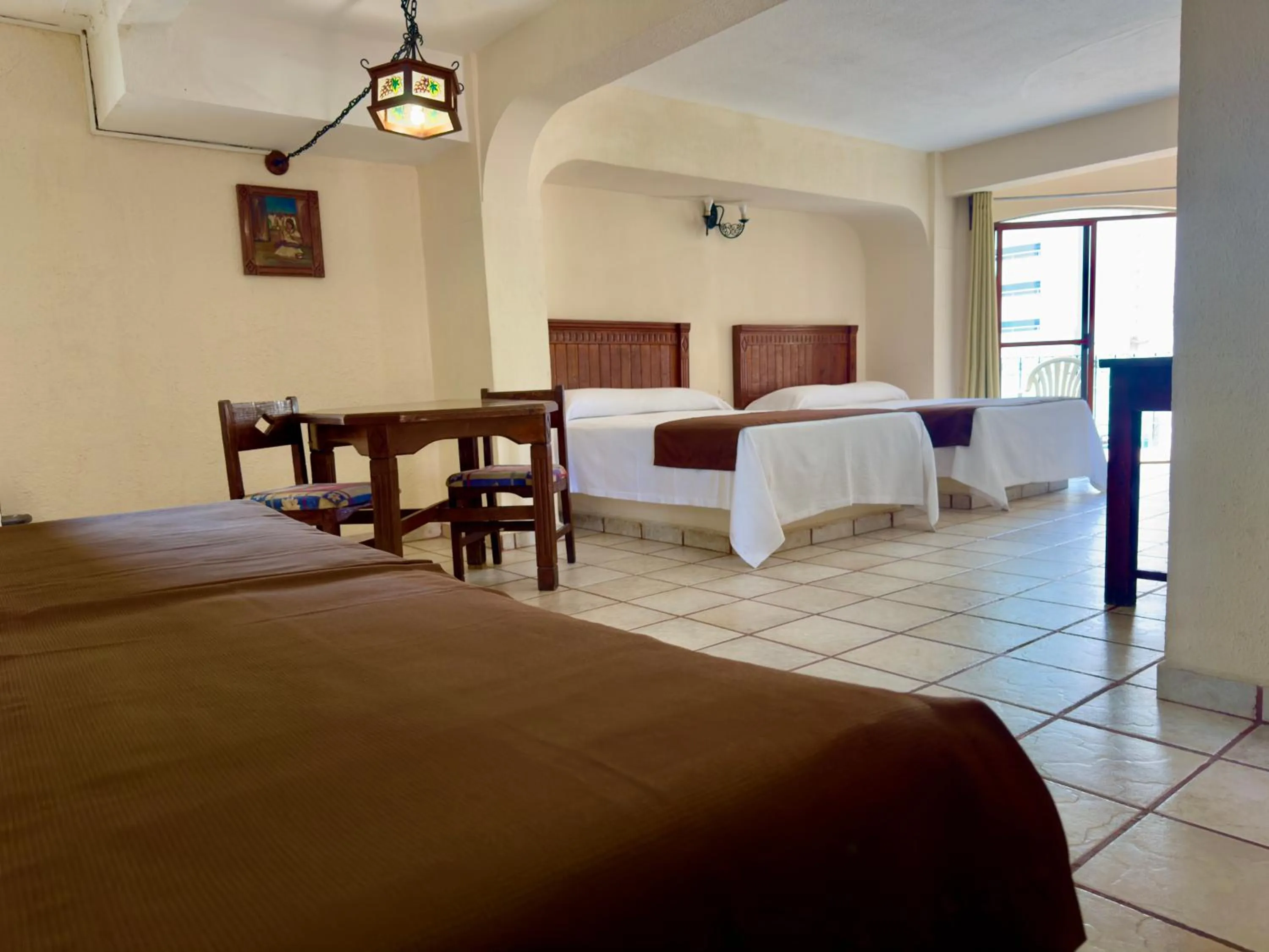 Bed in Hotel Hacienda María Eugenia Acapulco