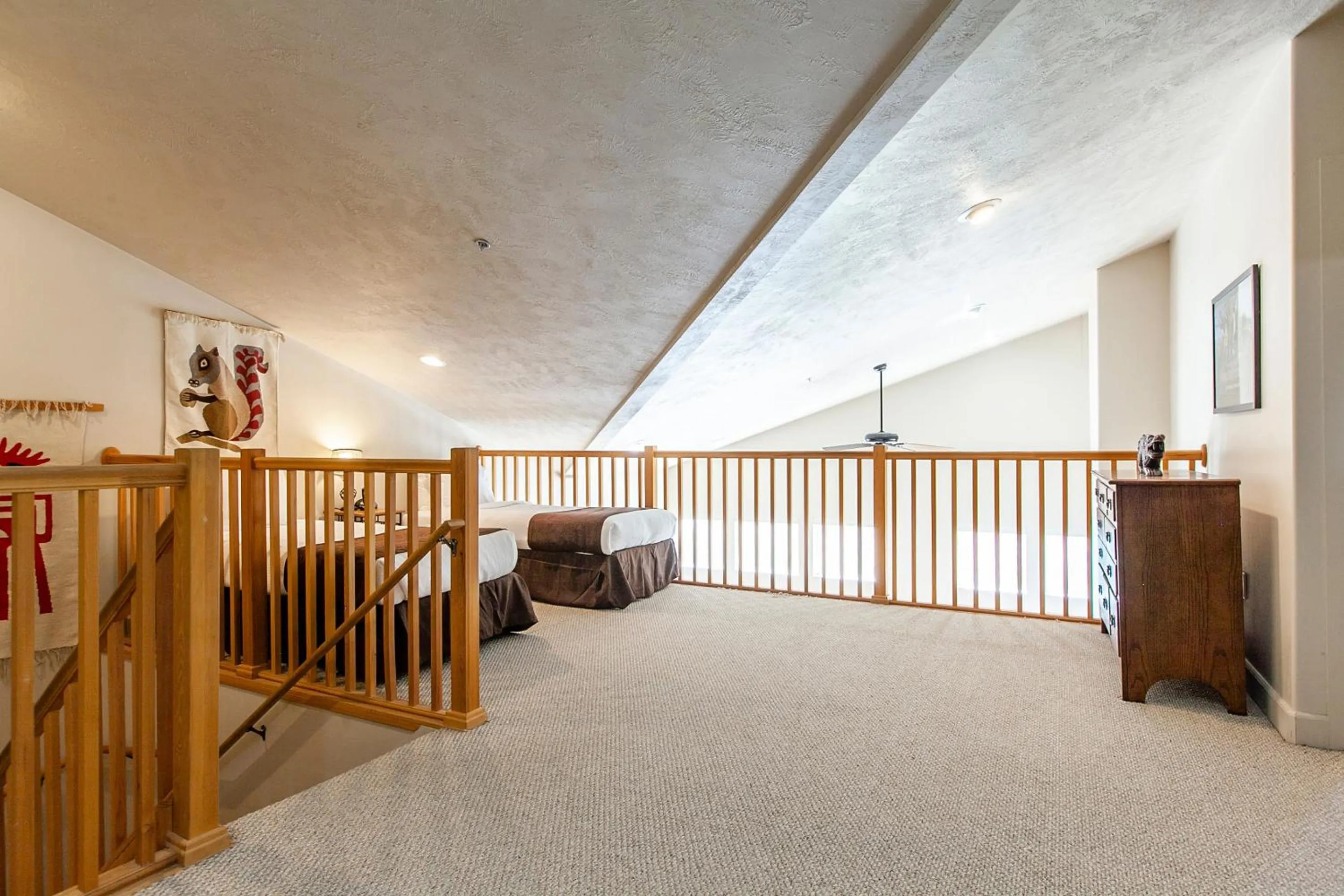 Bed in Crestview Condominiums by All Seasons Resort Lodging