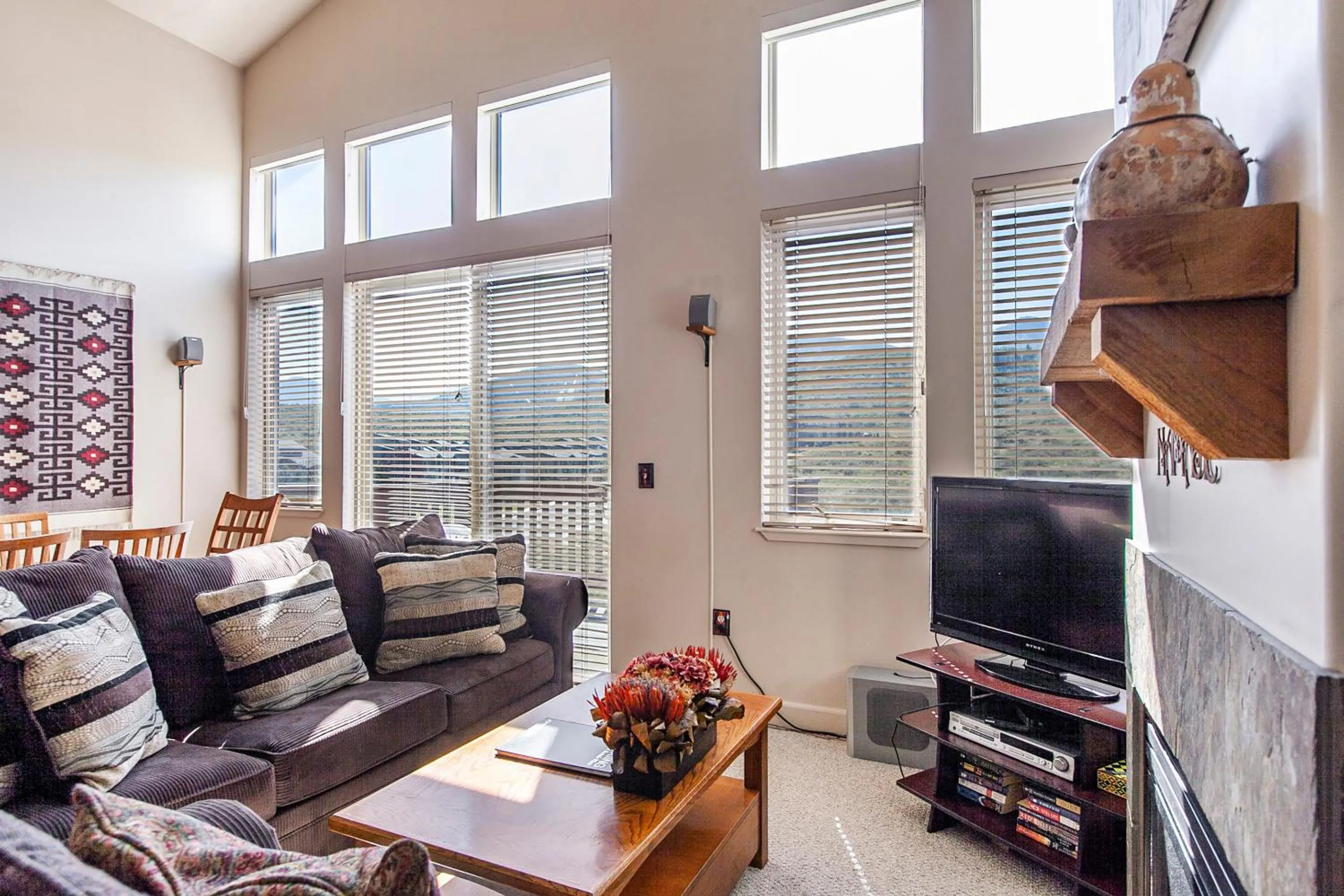 Living room in Crestview Condominiums by All Seasons Resort Lodging