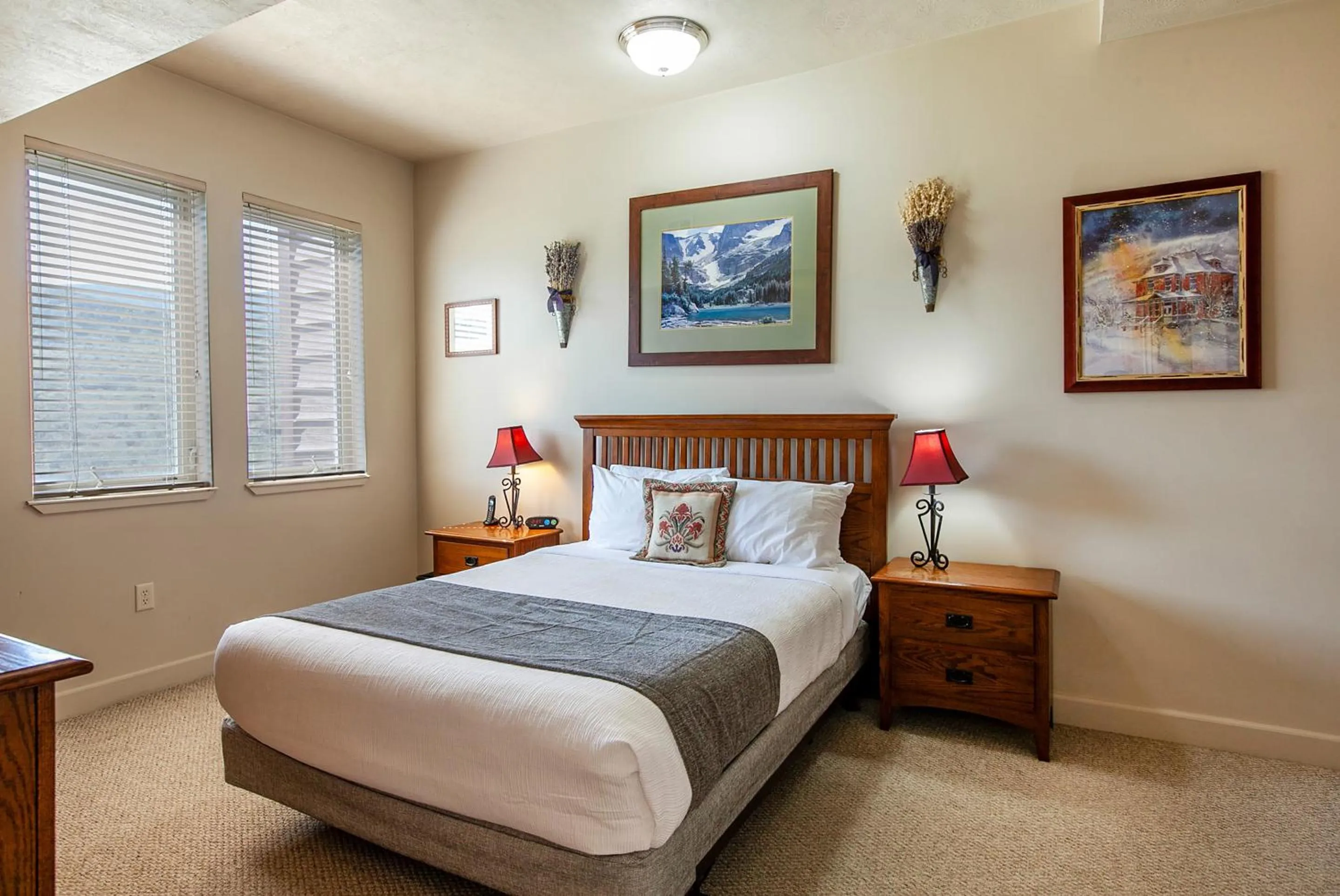 Bed in Crestview Condominiums by All Seasons Resort Lodging