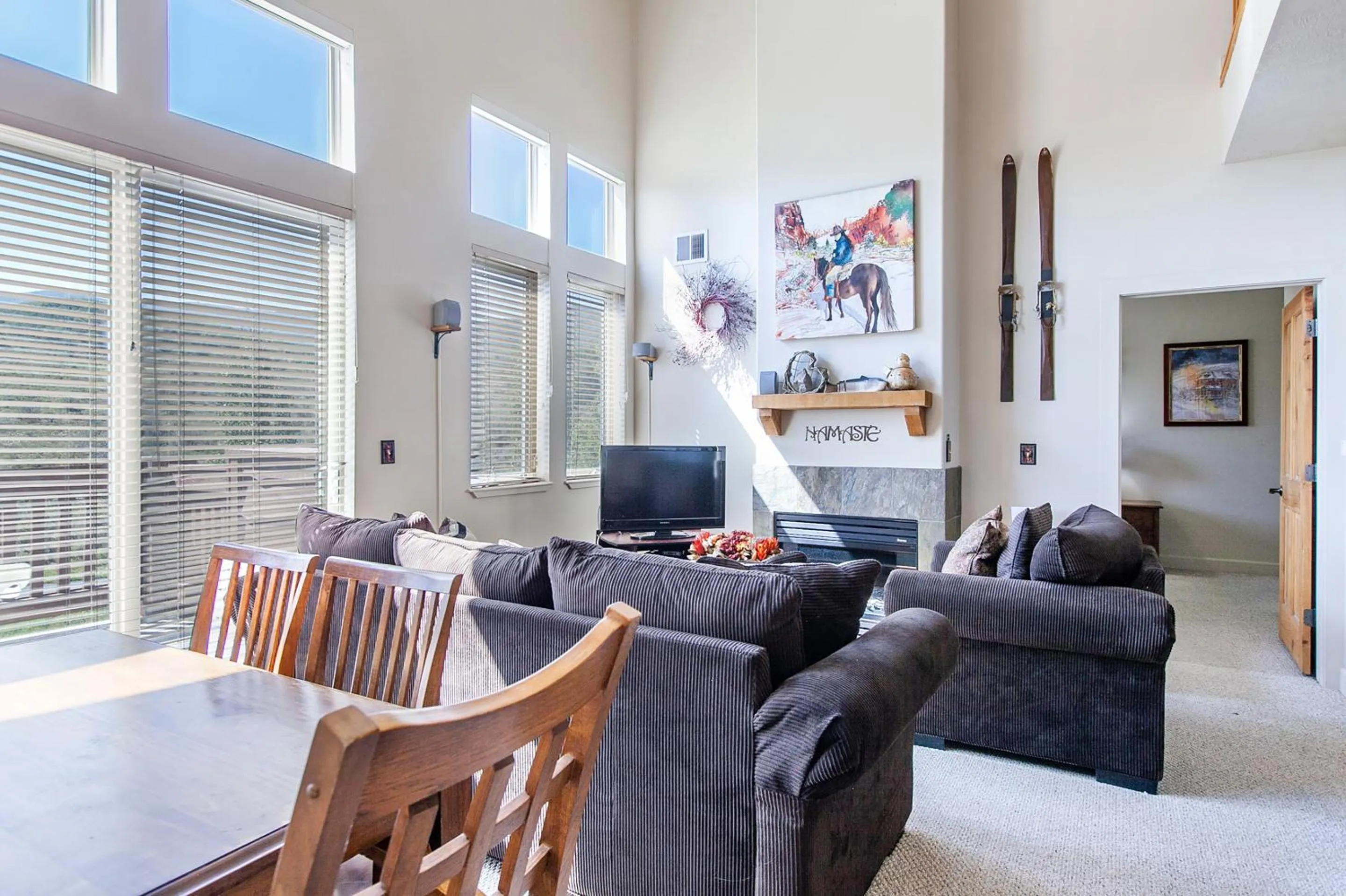 Living room in Crestview Condominiums by All Seasons Resort Lodging