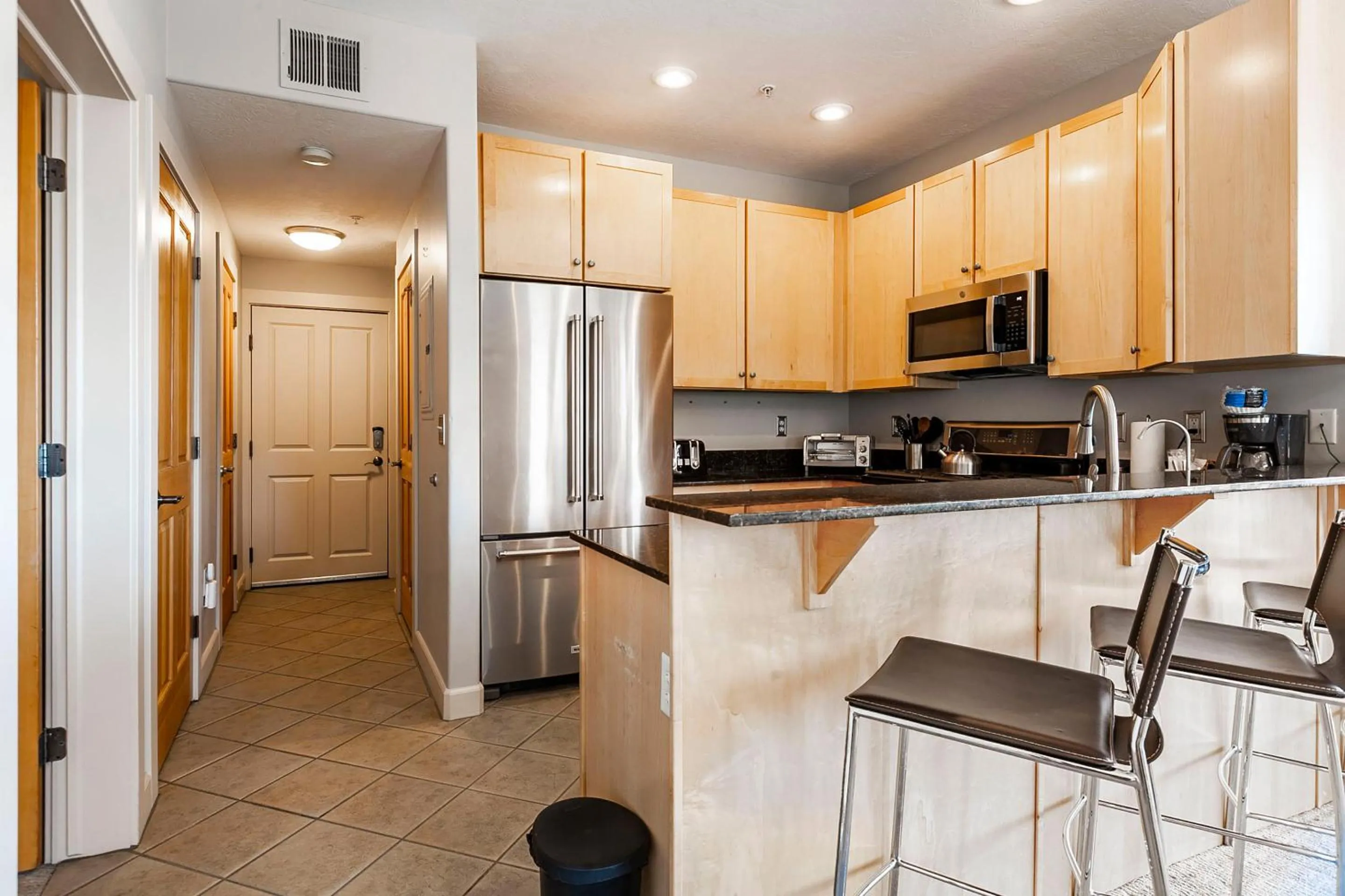 Kitchen or kitchenette in Crestview Condominiums by All Seasons Resort Lodging