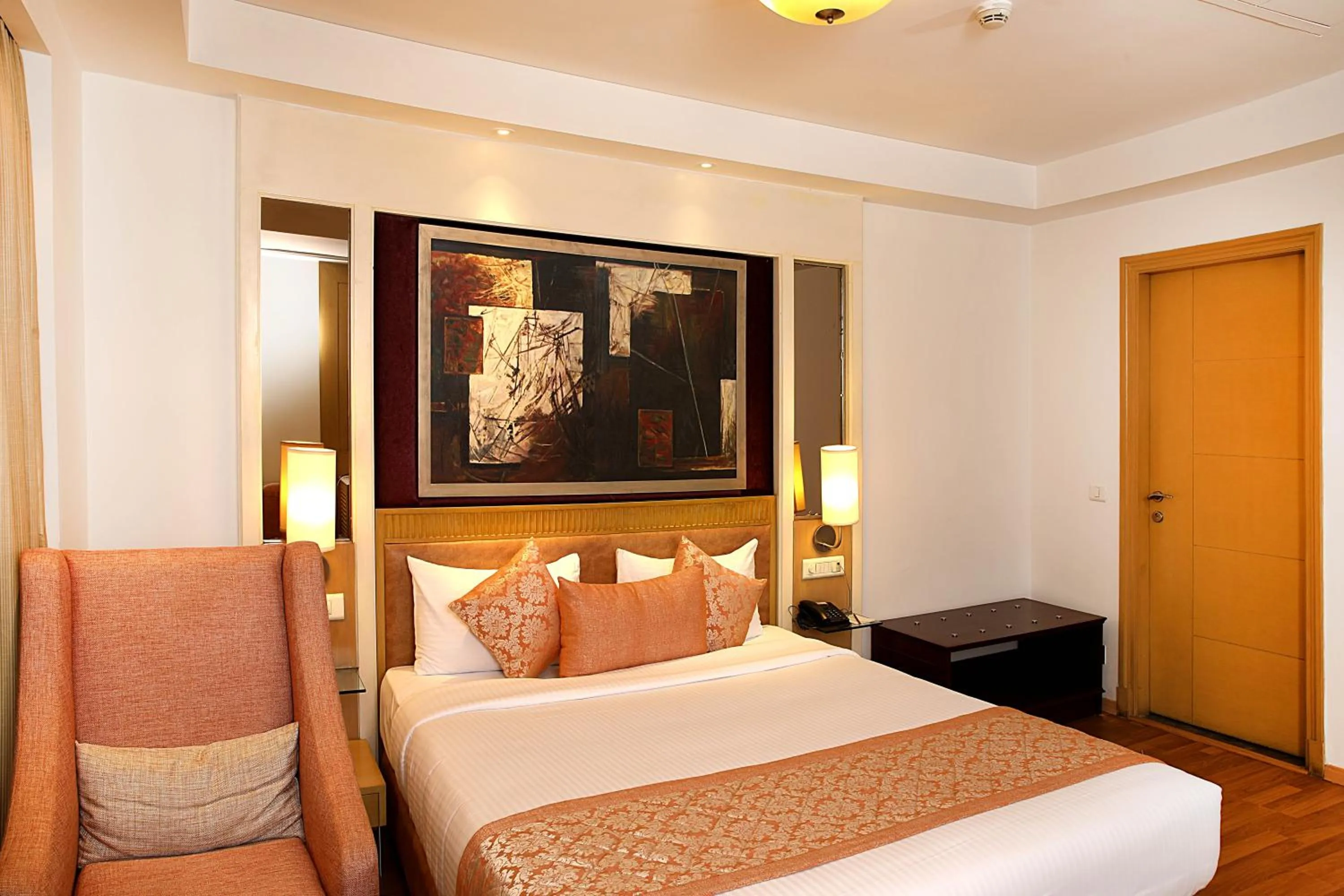 Bedroom, Bed in Inde Hotel Vista Woods Huda City Centre, Gurgaon