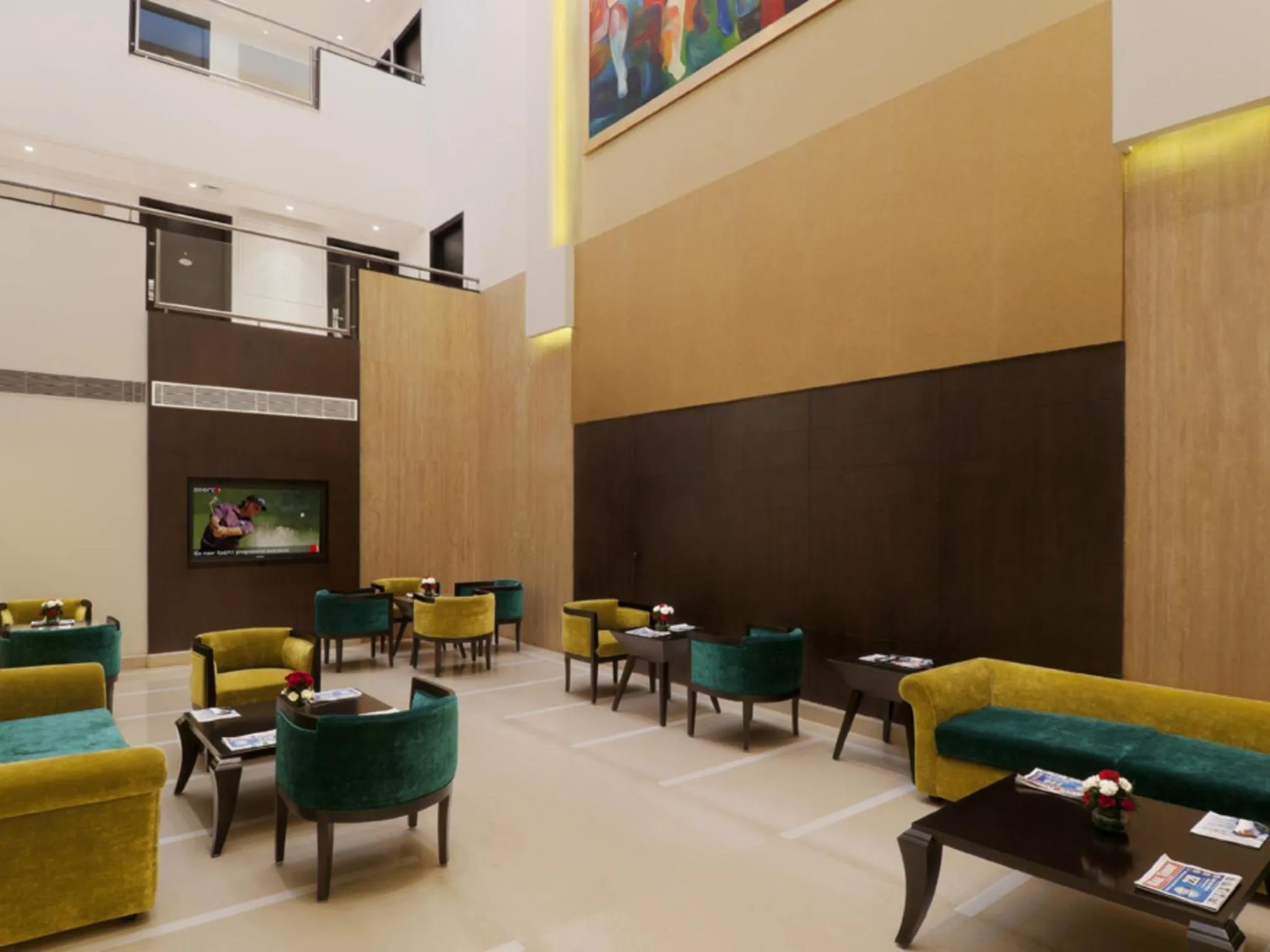 Communal lounge/ TV room in Inde Hotel Vista Woods Huda City Centre, Gurgaon