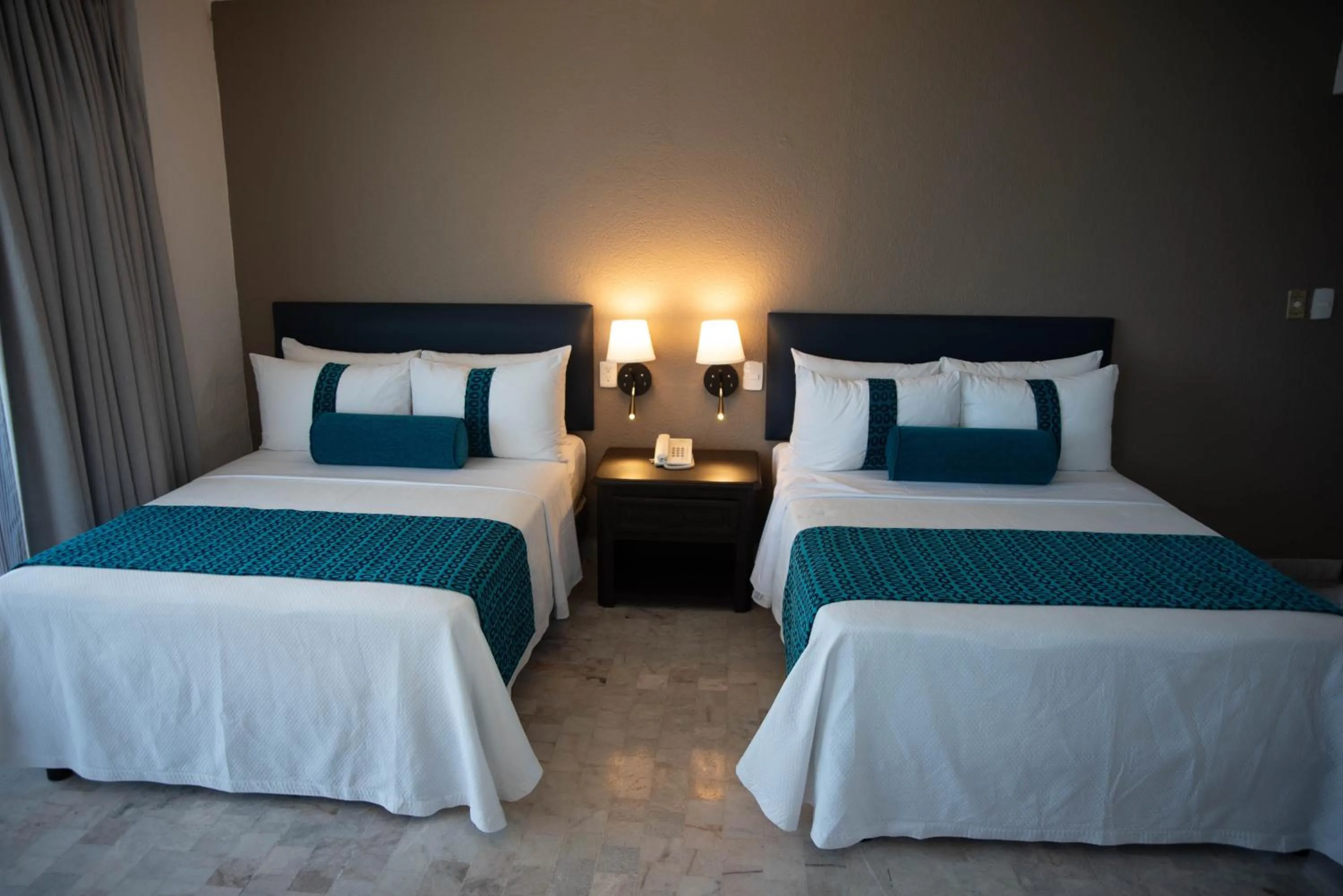 Photo of the whole room, Bed in Ritz Acapulco All Inclusive