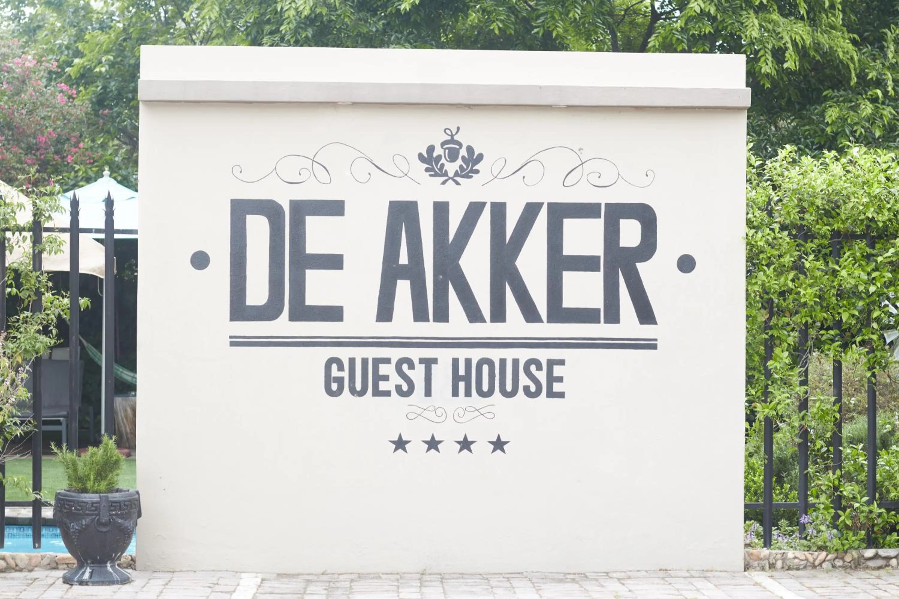 Property logo or sign in De Akker Guest House Oudtshoorn