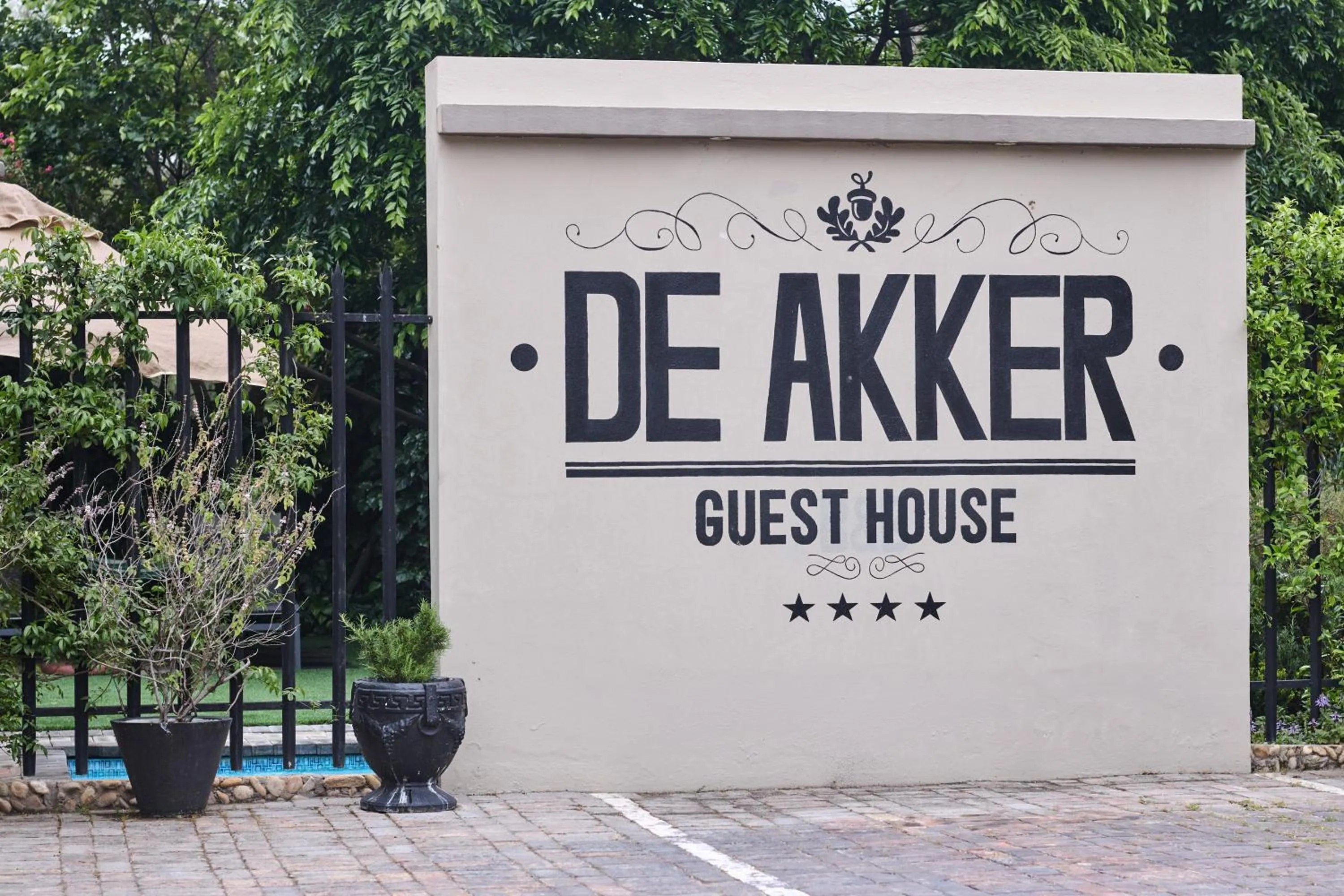 Property logo or sign in De Akker Guest House Oudtshoorn
