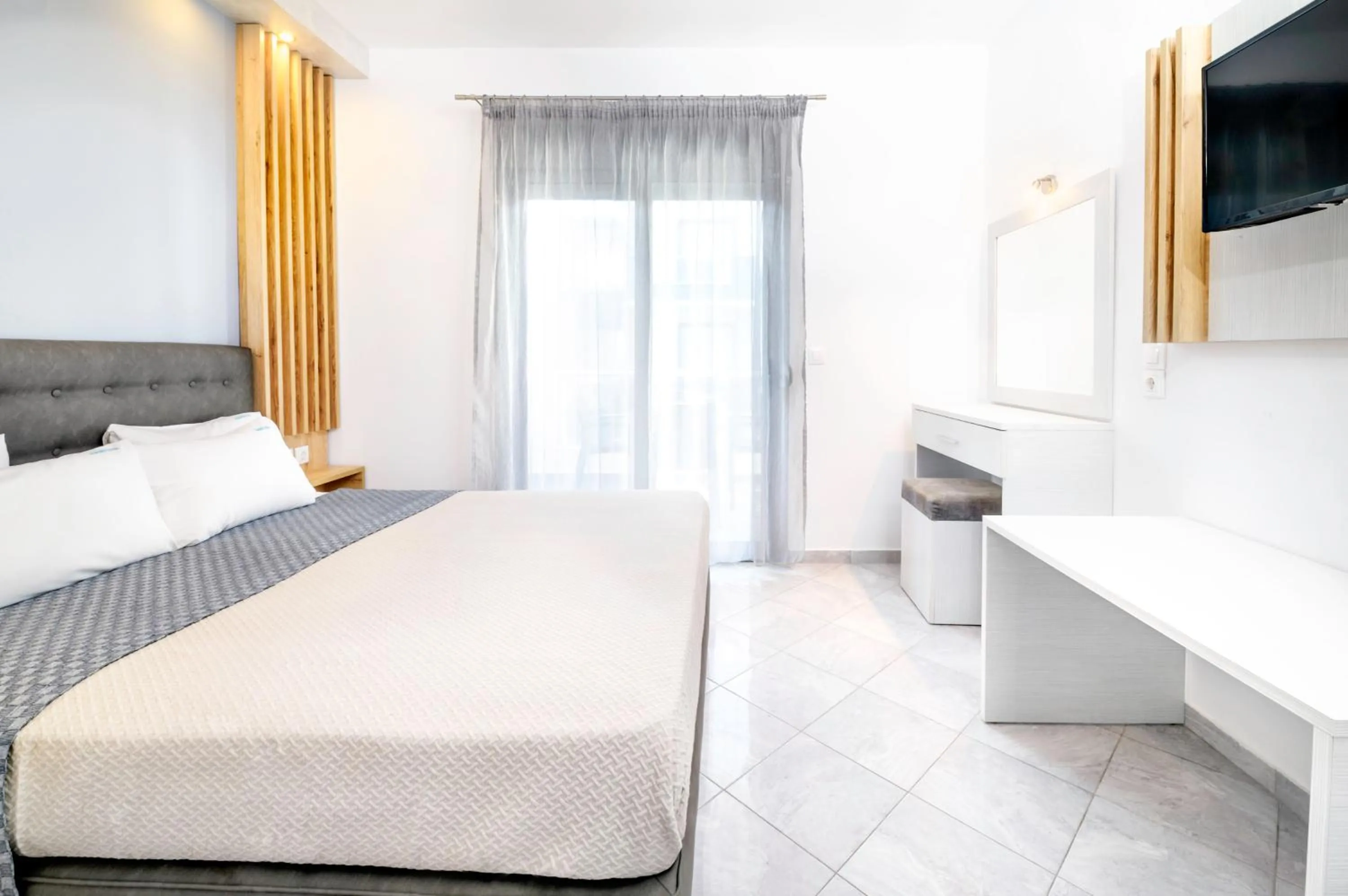 Photo of the whole room, Bed in Akritas Hotel Pefkochori