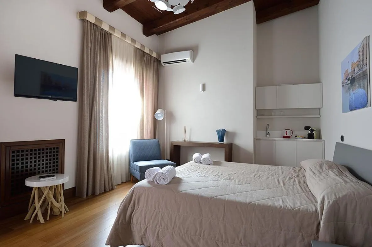 Photo of the whole room, Bed in Casa Realia