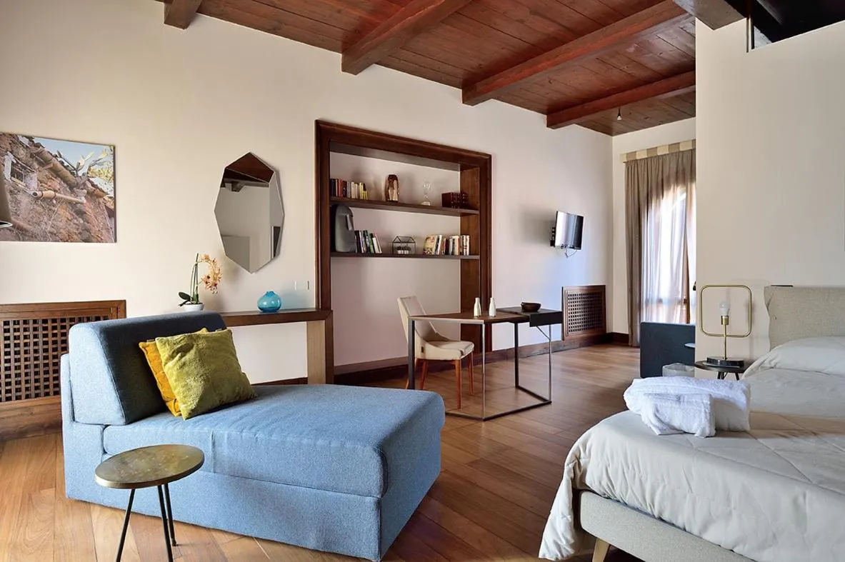 Seating area, Bed in Casa Realia