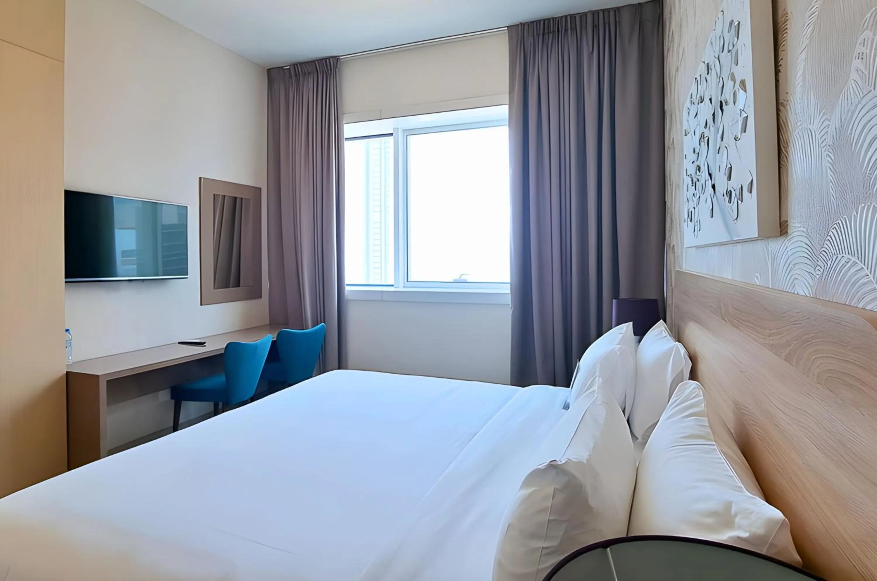 Bed in Barceló Residences Dubai Marina