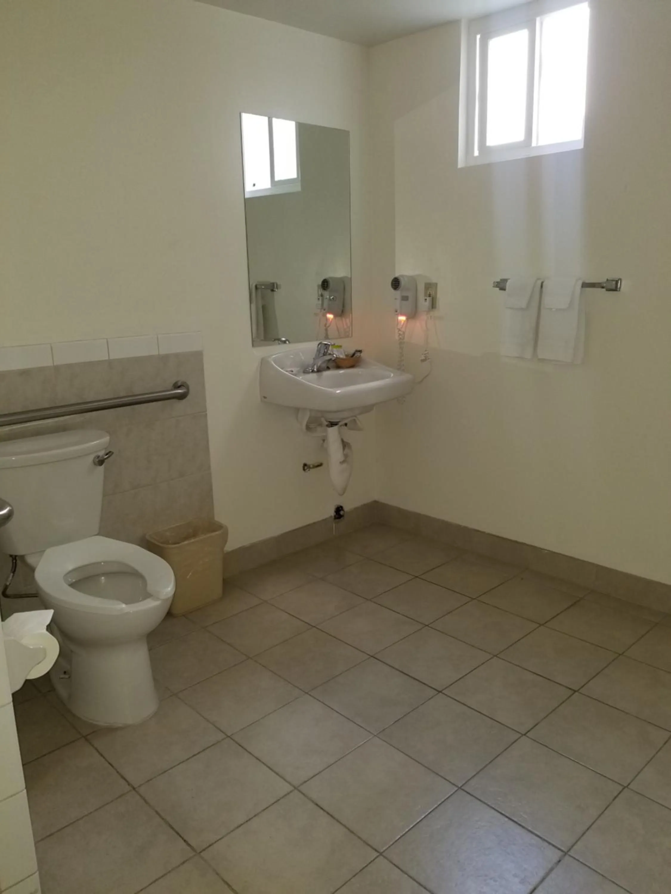 Toilet in Super 8 by Wyndham Los Angeles-Culver City Area
