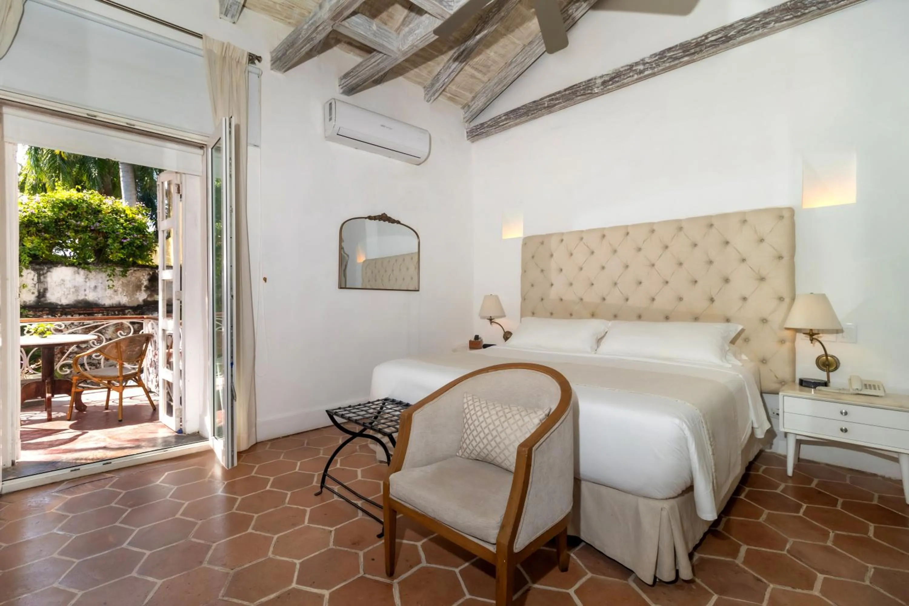 Living room, Bed in El Marques Hotel Boutique By GEH Suites