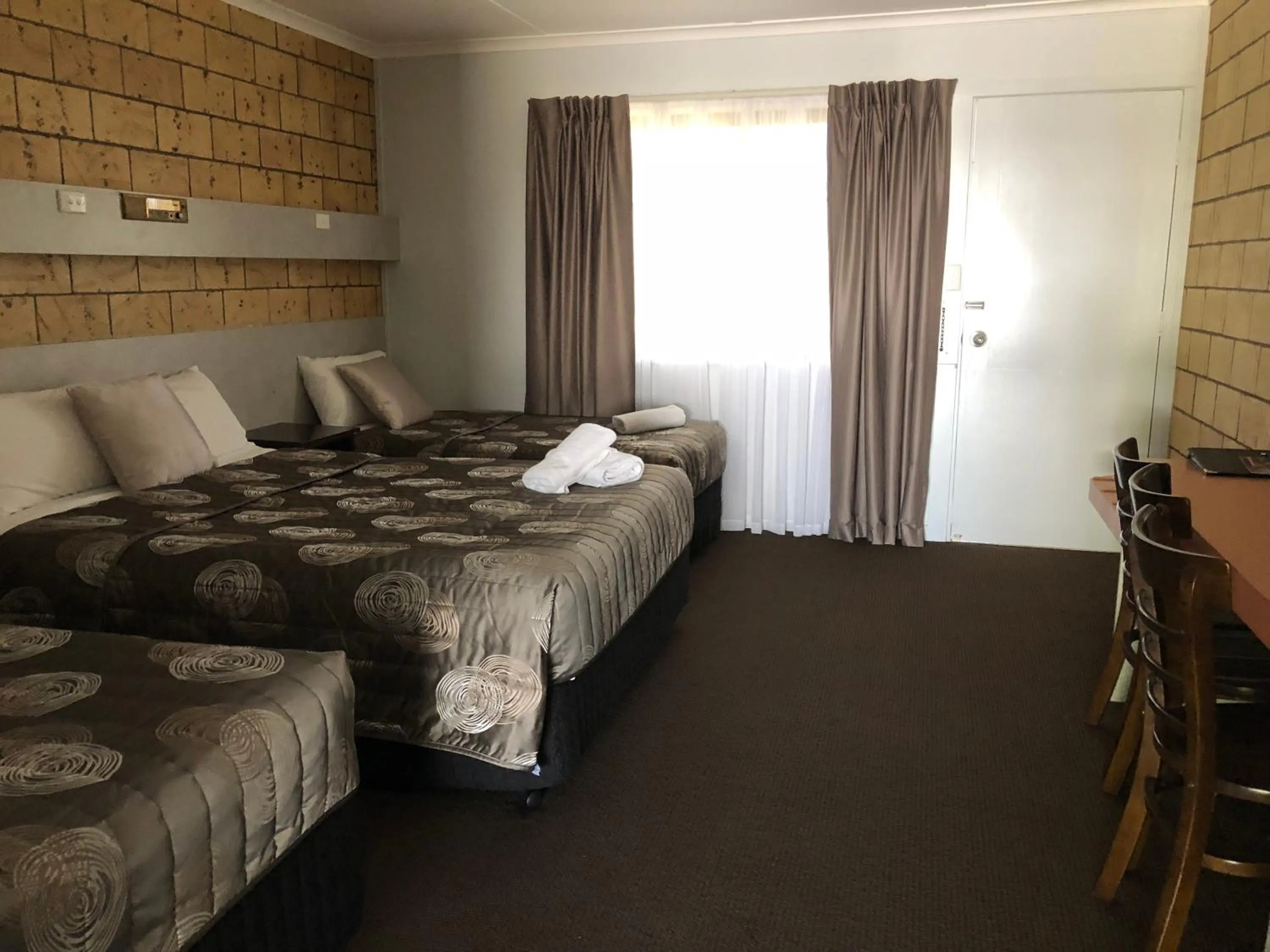 Bed in True Blue Motor Inn