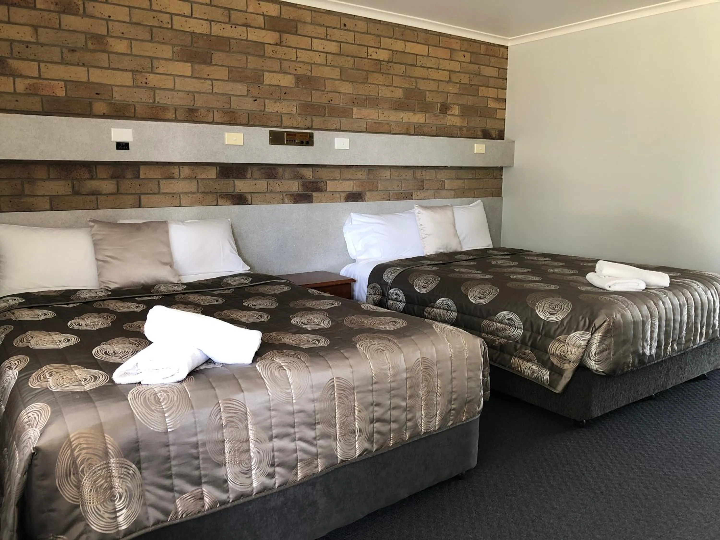 Bed in True Blue Motor Inn