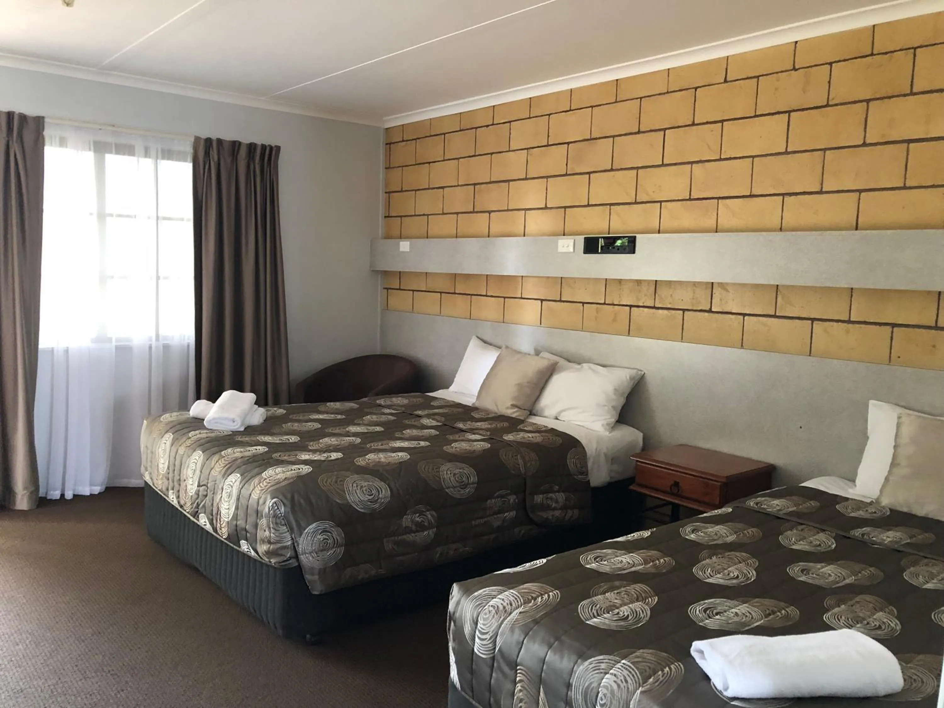 Bed in True Blue Motor Inn