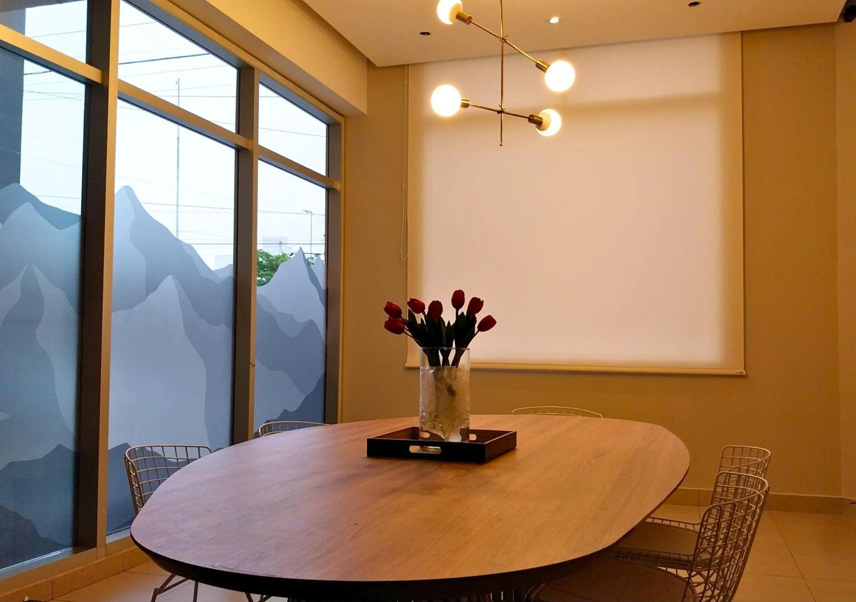 Seating area in Roomie Salta by DOT Suites