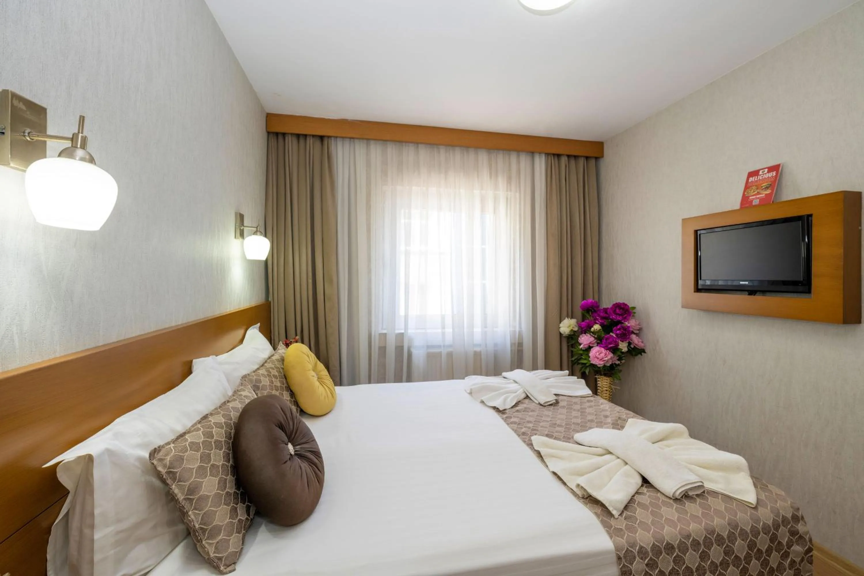 Bed in Grand Ons Hotel