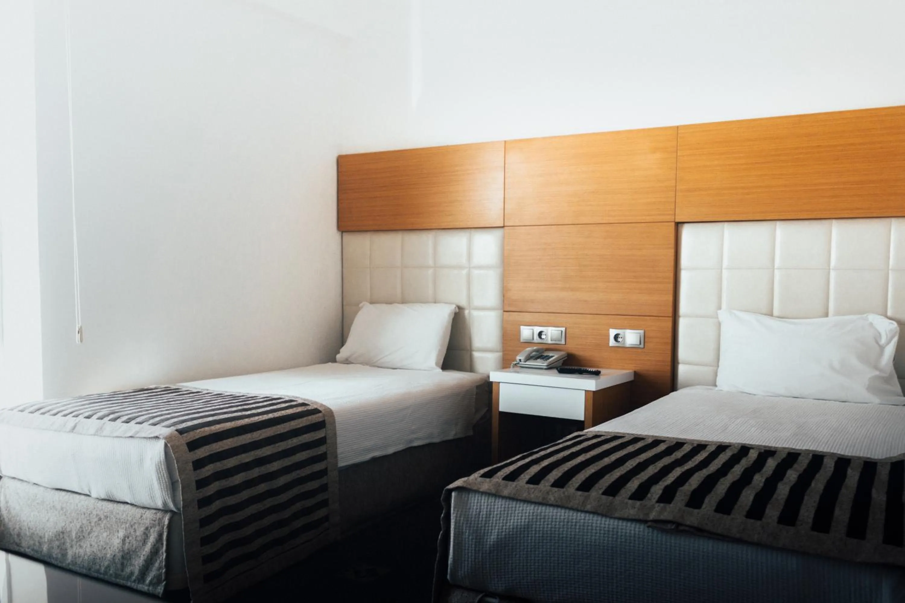 Bed in Nüzhet Hotel