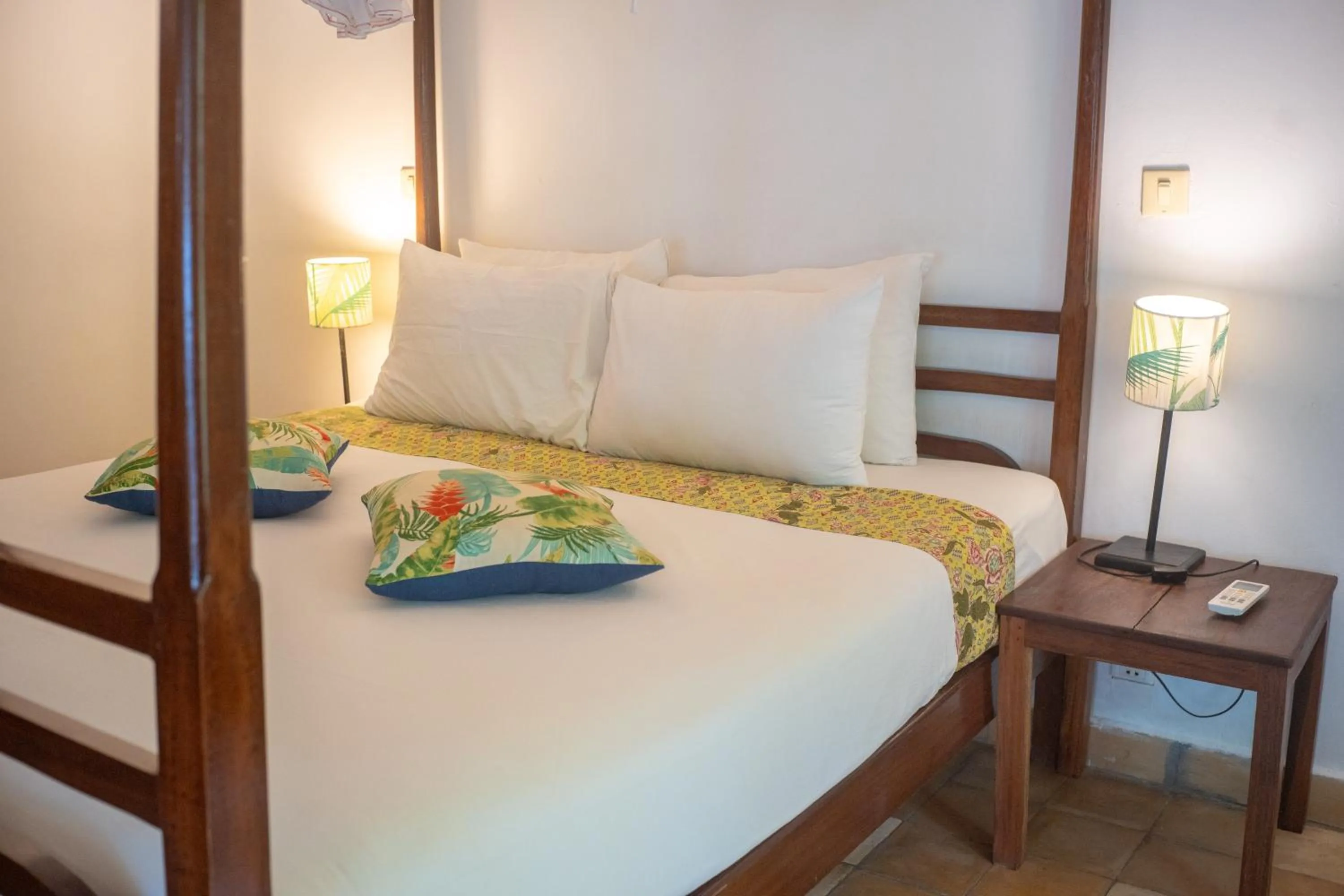Bed in Sambor Village Hotel