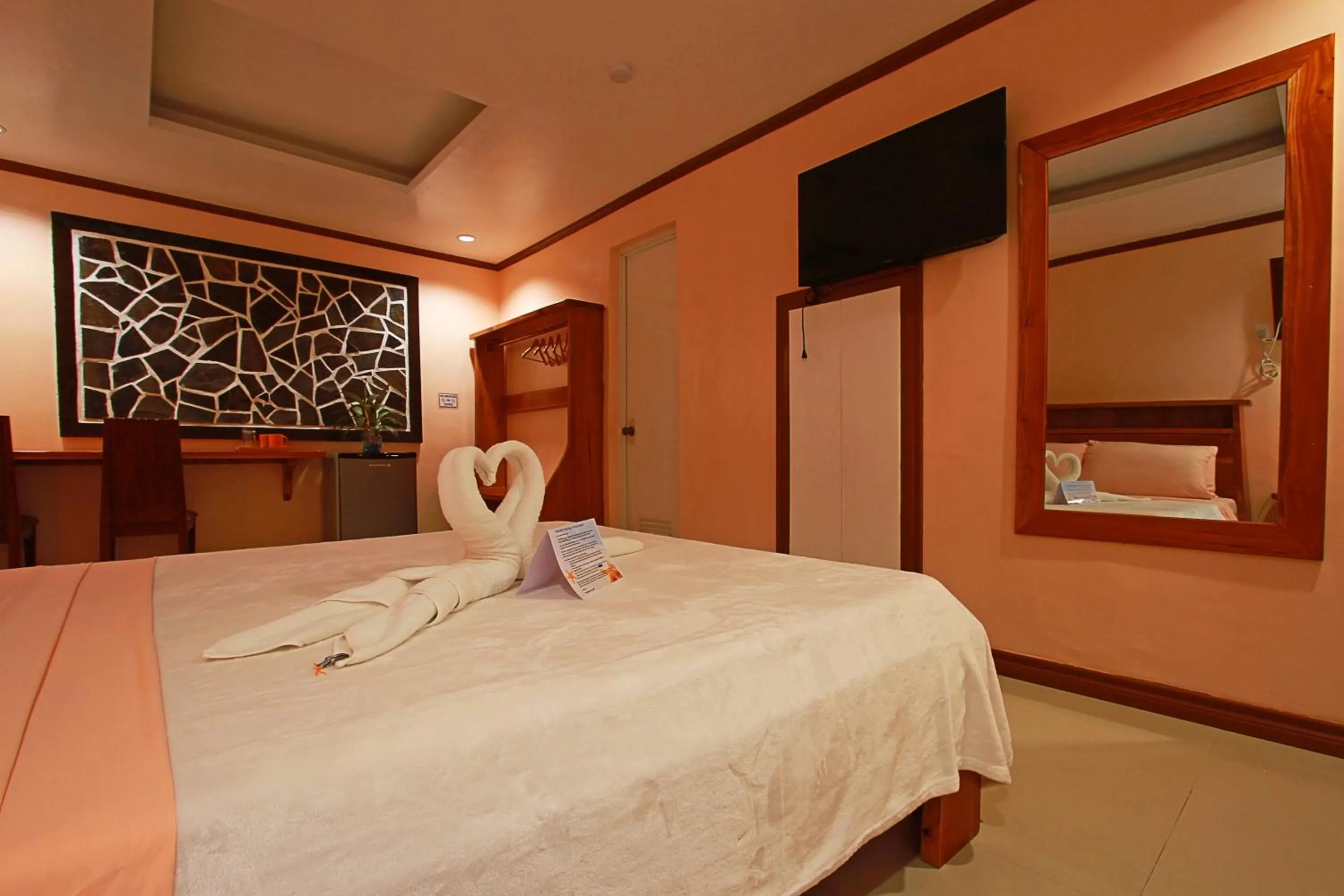 Bed in Nigi Nigi Too Beach Resort