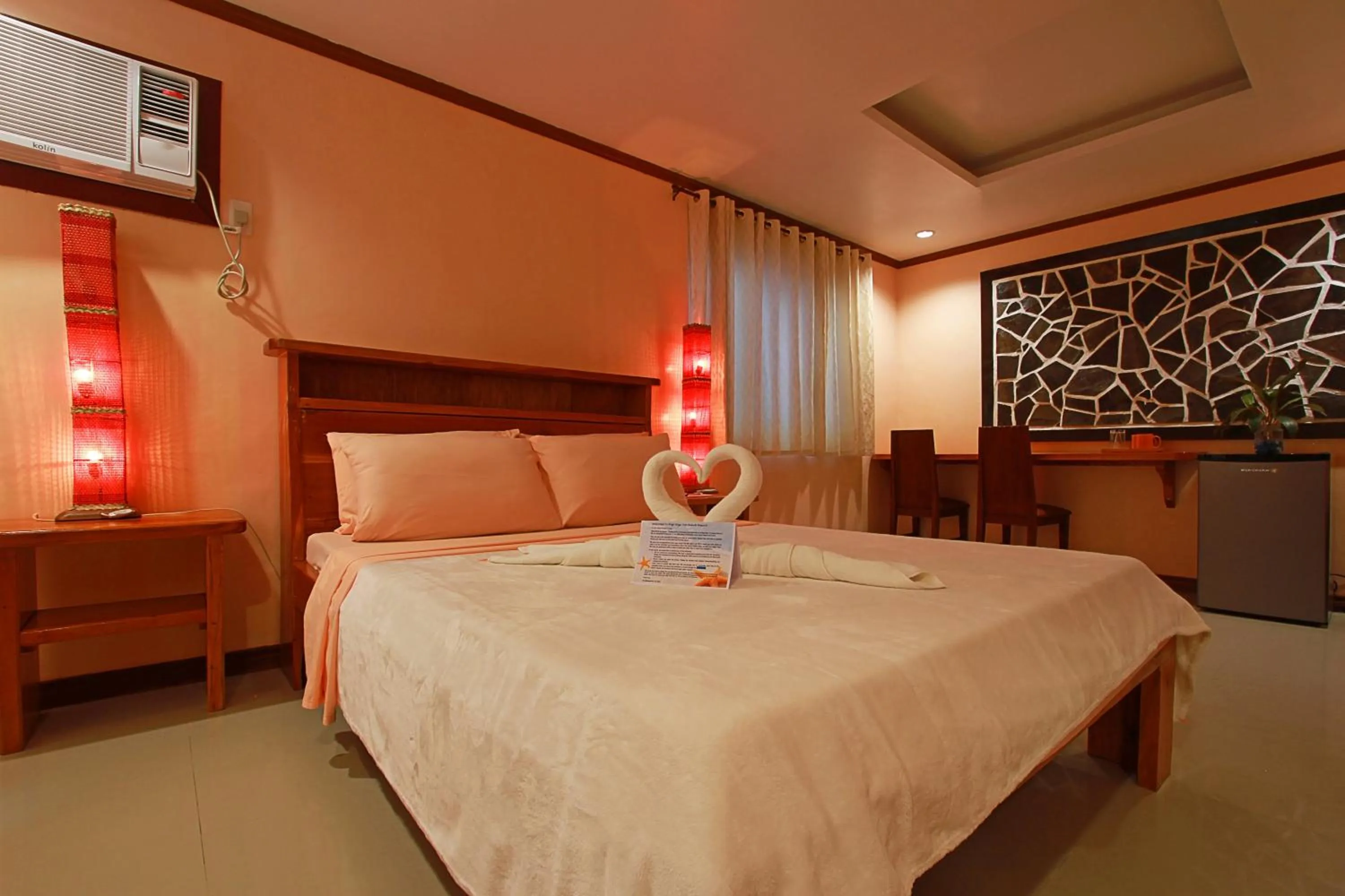 Bed in Nigi Nigi Too Beach Resort