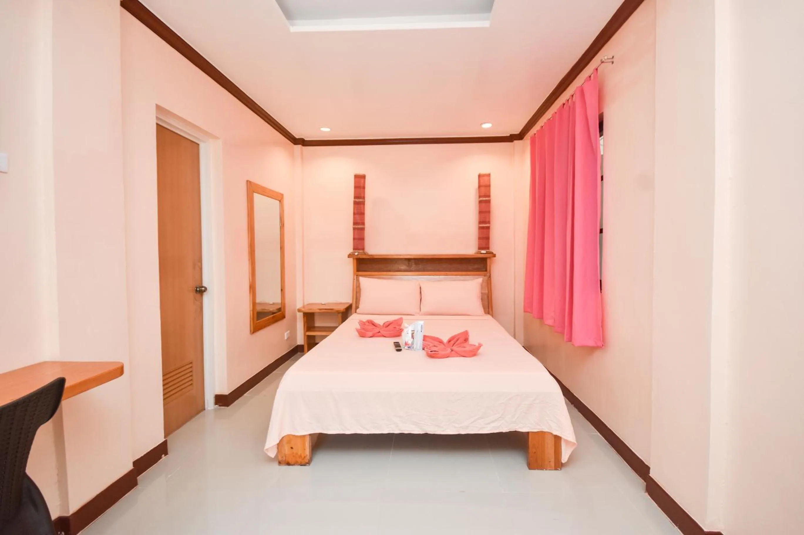 Bed in Nigi Nigi Too Beach Resort