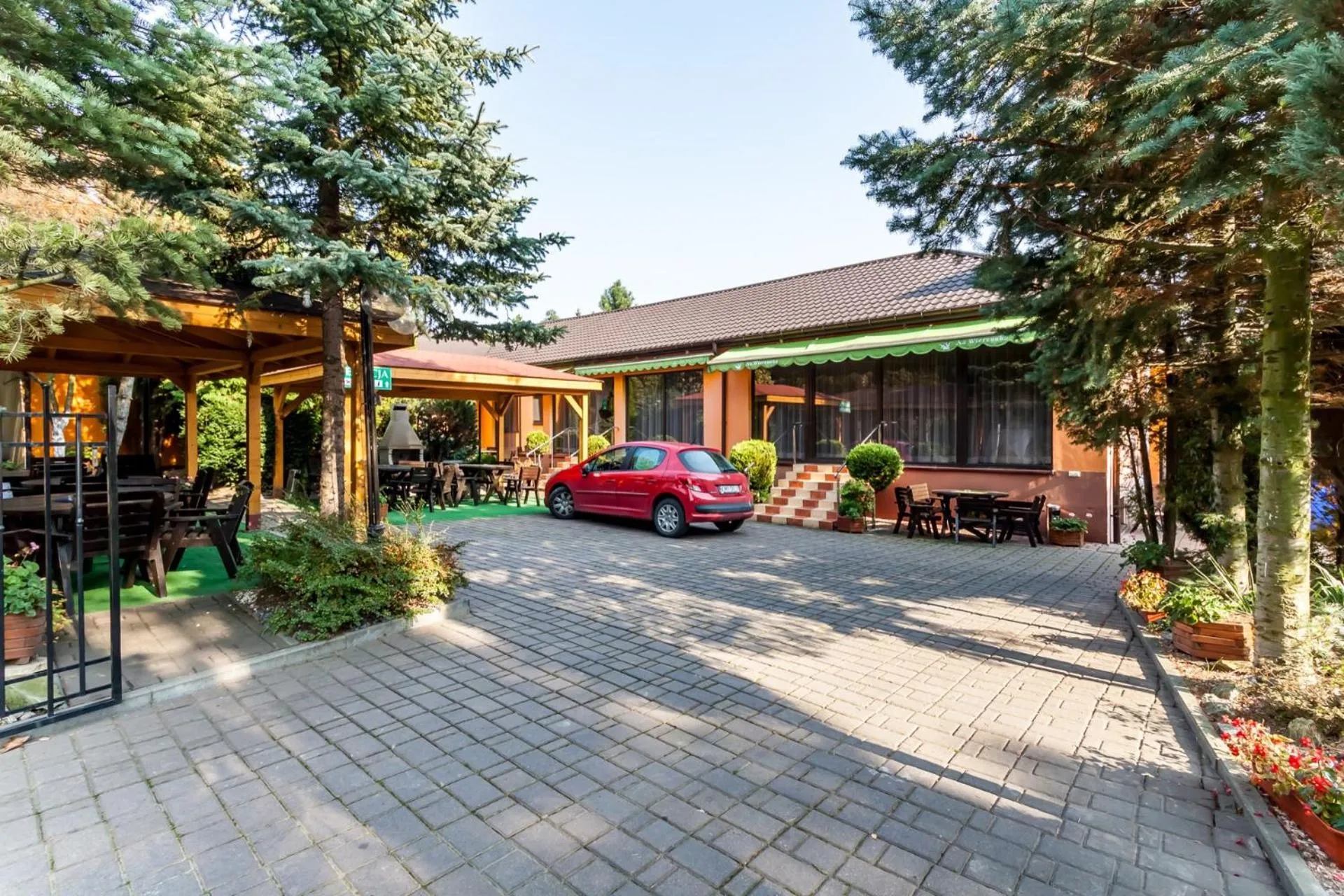 Garden view in Eko Hotel Na Wierzynka & Park Pinokia