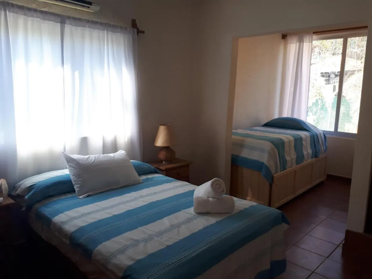 Bed in La Vivienda Villa