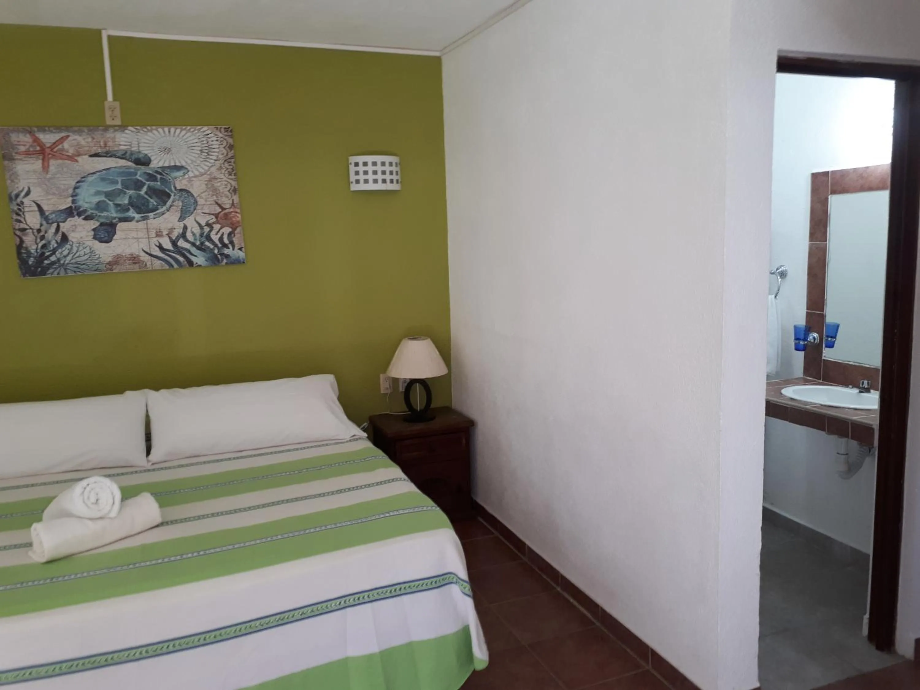 Bathroom, Bed in La Vivienda Villa