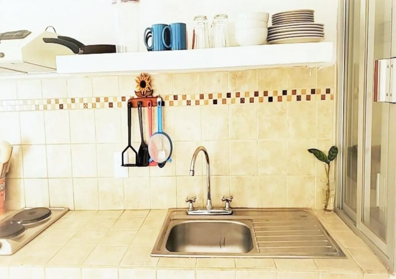 Kitchen or kitchenette in La Vivienda Villa